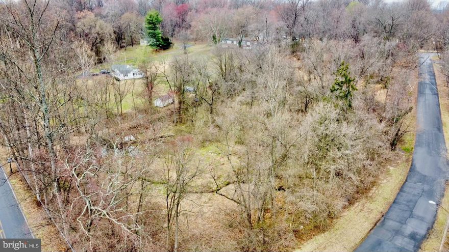Welcome to this subdividable lot in one of the most highly desired areas of Montgomery County. Excellent opportunity to build an estate home with significant land and privacy, or subdivide to build three  2400SF homes per acre, with resale value of   $780-900k. Previously, the county had indicated the property may be divided into three separate lots - the first lot is public water/sewer approved, the other two lots will likely be well/septic. Previous PERC completed and passed, and building permit was approved then expired before finalization. All previous (now expired) permits are available through the Montgomery County Permitting Search Website. Architectural designs available with a ratified contract. Buyer Due Diligence to verify all permitting status and/or subdivisibility.
