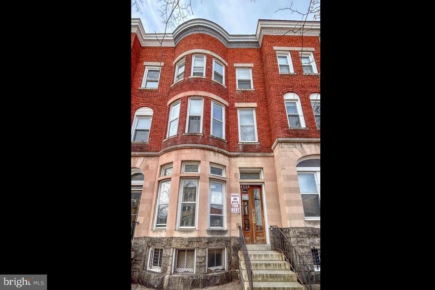 > Prime Location Near Johns Hopkins University: Just four blocks from the Homewood Campus, these apartments are highly sought after by young professionals and students alike.
> Value-Add Potential: Opportunity to upgrade apartments and significantly raise rents in this high-demand area.
> Utility Pass-Throughs in Place: Tenants cover 100% of water, gas, and electric costs, enhancing cash flow and boosting overall.
> Walkable Convenience: Positioned between the Charles Village Shopping District and 25th Street’s bustling retail scene, tenants can accomplish most errands on foot. 
A spacious, inviting hallway with an impressive wooden staircase creates a welcoming atmosphere for tenants and visitors. Kitchens are designed with laminate countertops and a variety of cabinetry styles, from modern wood to European-inspired options, offering low-maintenance durability and visual appeal. Living spaces feature a mix of wood and laminate flooring, while bathrooms are equipped with functional, modern vanities or wall-mounted sinks and durable vinyl tub surrounds. The basement and third-floor apartments include dens, adding valuable living space.

The office occupies the entire first floor, featuring a private front room that overlooks the tree-lined Maryland Avenue. A larger office area is situated in the rear, accompanied by a half bathroom and a storage room. Both rooms are enhanced by decorative mantles and large windows, creating bright, inspiring workspaces. A central boiler provides heating for all units, with hot water baseboard heat in the basement apartment and hot water radiator distribution for the upper-floor apartments. Two air handlers cool the units: one serves the basement and first floor, while the other serves the second and third floors. A central State Select 40-gallon gas-fired water heater supplies hot water. Observable water supply lines are copper or C-PVC, and observable drain lines are PVC. The property has one electric meter and one gas meter. The landlord bills back for all utilities, keeping monthly utility costs down and more cash in hand. This mixed-use 4-unit in Charles Village is located just four blocks south of Johns Hopkins University Homewood campus, and three blocks south of Wyman Park Dell. Tenants enjoy a quick walk to the Charles Village Shopping District or Safeway grocery store, and I-83 provides a quick commute to downtown Baltimore. 2528 Maryland Avenue garners a “Walker’s Paradise” designation, with a 91 Walk Score and an 89 Bike Score, being located along the Maryland Avenue Cycle Track. RHouse, Remington’s trendy food hall, is home to popular stalls like Creole Soul and Koshary Corner and is within a 5-minute walk.

Rents at time of Sale:  1st floor office: $1,100.  Apt 2: $785.  Apt 3: $875.  Apt 4: $770 (vacated prior to sale)