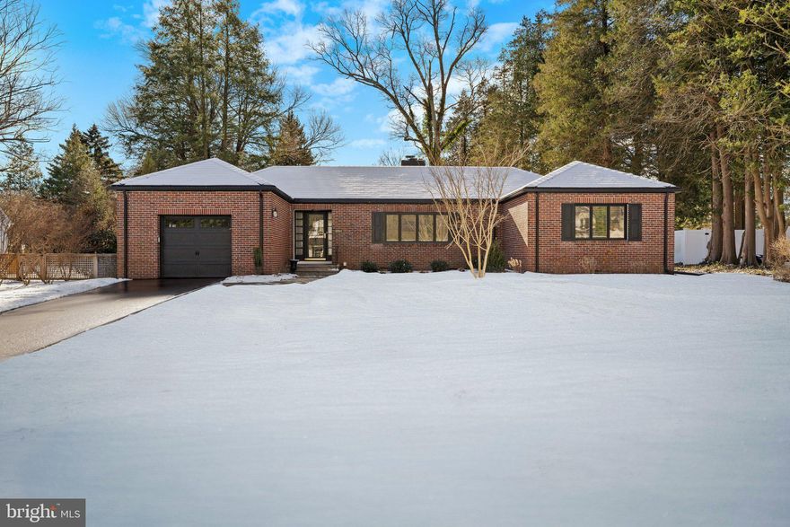 Stunning California modern style ranch in desirable Yardley! Welcome to 1011 Evergreen Road, a beautifully restored ranch nestled on one of Yardley's most coveted and picturesque streets. This meticulously maintained home seamlessly blends modern amenities with classic charm, offering an inviting retreat for contemporary living. This quaint custom-built ranch is located in Glenwood, one of old Yardley's most sought-after neighborhoods. A quiet and charming neighborhood showcasing mature trees and meticulously kept homes. Recently completed work includes these key features:  Exterior & Curb Appeal: The chimney and stunning slate roof has been carefully restored, enhancing the home's striking façade. The front and back yards have been newly landscaped and fully fenced for ultimate privacy. Interior Details: Step inside to discover neutral tones and restored hardwood floors that flow throughout the main level. Abundant natural light floods the space, complemented by all-new lighting, fixtures and AC. Living Spaces: The spacious living room features a beautiful wood-burning fireplace, flanked by twin sets of 10-lite panel French doors that open to a covered patio. This area is perfect for entertaining, with an outdoor brick grill/fireplace and a gazebo on an elevated deck. Kitchen & Dining: The modern kitchen boasts elegant maple cabinetry, granite countertops, stainless steel appliances, and a charming bar area. It flows effortlessly into the dining room, ideal for gatherings with family and friends. Bedrooms & Bathrooms: This home offers two generous bedrooms that can accommodate king size beds, both equipped with built-in closets and shelving. The classic bathroom features a nostalgic black-and-white design with a tub, stall shower, and double vanity. A conveniently located half bath is tucked away behind a closet door in the front bedroom. Versatile Basement: The full basement, previously set up as a game room, provides ample space for recreation or relaxation. It includes a dedicated laundry area, workshop, and a partially finished room perfect for guests or as an office. Parking & Garage: Enjoy the convenience of a 3-car driveway and an oversized single-car garage with high ceilings, perfect for extra storage. This charming home has been loved and cared for by its owners over the years. Don’t miss your chance to own this gem that perfectly balances modern comforts with timeless elements. Schedule a showing today and experience all that this treasured home has to offer!
