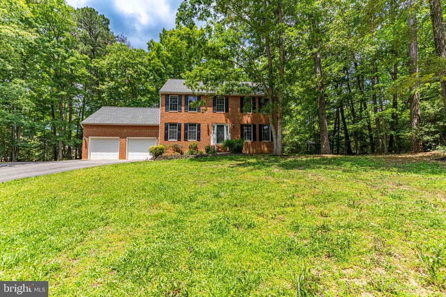 HUGE PRICE REDUCTION! Build *** INSTANT EQUITY ****Wonderful 3 story colonial in private community setting close to PAX River Naval Base! Situated on private tree filled 2 acre lot. Large light filled windows, wood floors and ceramic tiled floors welcome you into the home,  Open concept kitchen and family room offer wood stove insert for cool evenings and door to new deck in the rear yard for warm summer days. Formal dining area , office space  and half bath complete the 1st floor. 4 bedrooms are located upstairs with 2 full baths. The lower level features a fully finished space and additional full bath, storage area.  This great home is close to Leonardtown Wharf, shopping, restaurants and more!