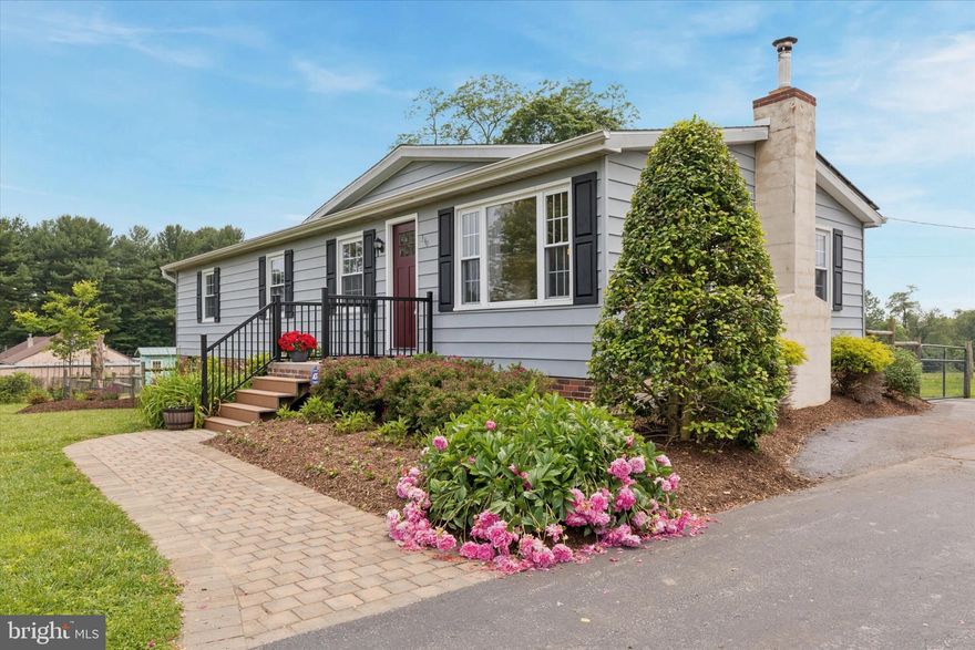 Set on just over an acre of open land, this charming 3-bedroom, 2-bath ranch blends peace, practicality, and space to grow. Whether you're dreaming of kitchen gardens, chicken coops, play sets, or even your own backyard soccer field—there’s room for it all. The fully fenced backyard lets kids and pets safely enjoy the outdoors. And just off the kitchen, a spacious deck (built in 2020) is perfect for weekend BBQs or relaxed dinners under the stars.
Inside, you'll love the open-concept layout connecting the kitchen, dining, and living areas—highlighted by a soaring cathedral ceiling that makes the space feel bright and airy. It's ideal for both everyday lounging and entertaining.
Down the hall, the primary bedroom is your private retreat, complete with an ensuite bath and walk-in closet. Two more generously sized bedrooms and an updated hall bath complete the main level.
Just a few steps down, you'll find a large bonus room with a cozy wood stove—perfect for a quiet family room, playroom, or home office. Nearby, the laundry and mudroom offer extra convenience, with direct access to the oversized two-car garage.
This home is move-in ready with gorgeous hardwood floors, brand-new carpet, and fresh paint throughout. Major updates include a brand-new HVAC system (2025), a 4-year-old roof with fully owned and transferable solar panels, a new septic system (2017), and a private well—all working together to help keep your utility costs low.  A pre-listing inspection has been done and is available.
This home truly has it all—privacy, smart updates, and plenty of space for whatever your lifestyle needs. Don’t miss it!