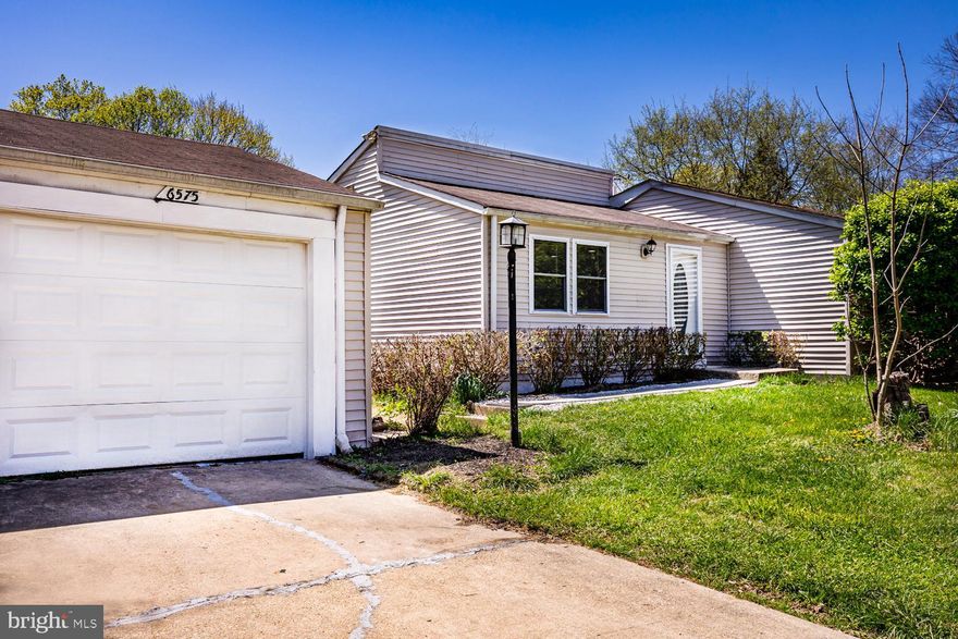 Make your home in this spacious, newly refreshed 3 bedroom, 2 bath rancher located on a quiet cul de sac in the heart of Columbia. The recently updated kitchen features freshly painted cabinets, new butcher block countertops,  fresh laminate flooring, and a new tile backsplash. The open concept kitchen and living room allows plenty of space for entertaining. Two roomy bedrooms have access to the updated full bath in the hallway, and the enormous primary bedroom has a walk-in closet and its own private full bath. Attractive laminate flooring throughout is easy to clean and lends a modern look to the whole house. The living room and each bedroom has its own ceiling mounted heating and cooling unit, each individually controlled so there's no fighting over the thermostat! For kids, a community playground is adjacent to the back yard. One car garage is included for parking or storage! This house will not last long, so apply today!