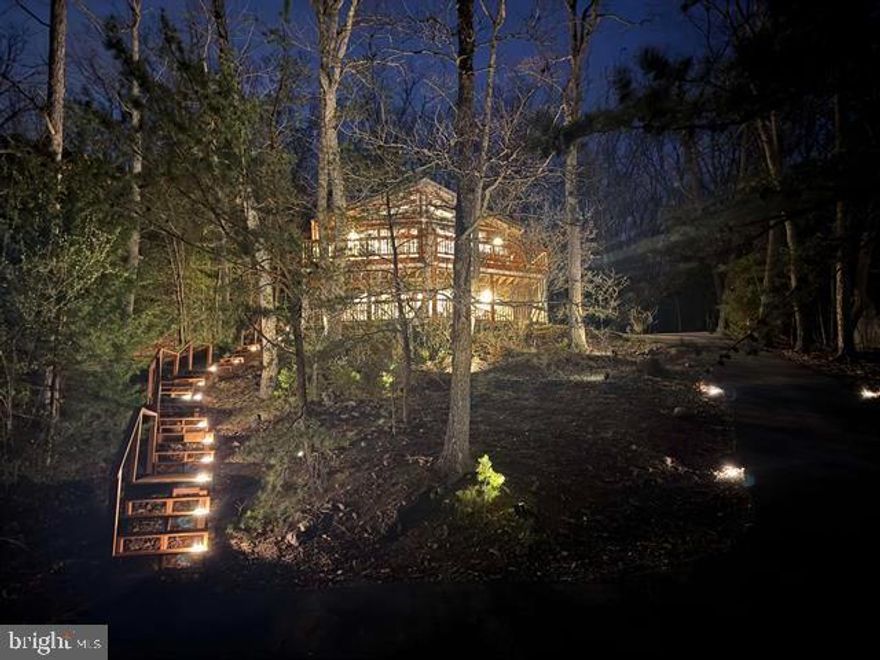 Nestled on top of Massanutten Resort this very well cared for chalet home is offered turn key and furnished ready for its next owner or guests to move right in. Stunning curb appeal and mountain style with newly built double level decking and screened porch. Large open concept Great room with vaulted and beamed ceilings offers stunning style and year-round Blue Ridge mtn Views! Woodburning stone fireplace with recently replaced chimney liner to snuggle up to after a day on the slopes! Recently Updated modern Kitchen with new onyx granite counters and stainless appliances! Main floor bathroom has recently been renovated and features a large double vanity. Oversized Paved driveway with amble parking for multiple vehicles. (2) new mini splits added for comfort plus a heat pump system. Rear fenced yard adjoins wooded open space for privacy and the VIEWS of the Blue Ridge in the distance. This a mountain home loaded with custom detail and character that will make it a great full-time residence or investment rental! Homes with character and style like this that have been well maintained rarely come to market. The benefits to Massanutten owners are abundant from Fishing to Hiking to Mtn Biking, Tennis, Pickleball, Pool and much more!