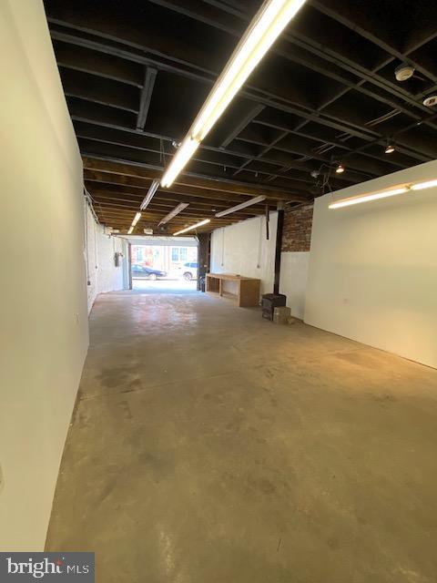 Here's something really special - a large and clean combination of studio-garage-work-shop-space (WITH PRIVATE GARAGE PARKING) together with a full bathroom, on the backstreet behind the 2500 block of Frankford Ave (Kern Street) - surrounded by great neighbors in a neighborhood that continues to build energy. This is 2576 FRANKFORD REAR (Enter the space through the garage door next to 2567 Kern). FRONT AREA WITH GARAGE DOOR ENTRY: 715 square foot garage-shop-studio type space, with legal off street parking for 2-3 vehicles. Space has great ceiling height, plenty of lighting and outlets installed, hard wired smoke detection, solid concrete floor. REAR AREA: accessed through the vintage fire door at back of shop, passing into rear with vestibule, a full bathroom with shower on the side. OUTSIDE: Stepping out from the shop, and next to the office there is a breezeway allowing for light into the garage. TENANT will be responsible for payment of utilities, except for water/sewer. TRANSIT: This is a few blocks from the Market Frankford train, the 5 bus serves the front of the building. THE NEIGHBORHOOD: There's strong continued investment all around this studio. This is close to many local business who've chosen the area for it's convergence of entrepreneurship, art-design-fabrication networks, and community care. LEASE length: Looking for a minimum one year lease commitment. Zoning readily provides for shop/art-craft studio/design studio/material storage/office operation and parking. Space is not zoned for assembly: lounge and entertainment uses, faith congregation assembly, day cares, high traffic fitness centers, auto body and auto repair are not permitted under the code. EXTRAS: The space was just cleaned and repainted - ready for you and your vision. This space has a great owner who cares about community and we'd like to hear about your endeavor. **Thanks**