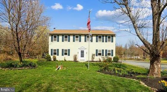 Check out the Video TOUR to see this SPACIOUS 4 BR 2.5 BA Stunning CUSTOM Colonial on Kent Island! Turn-Key & Boasting so much NEW! New Windows, Shutters, French & Sliding Glass Doors, New Master Bath w/upgraded Tile Floors & Shower, Fresh Custom Interior Paint throughout, New Flooring, SS Appliances, Hot Water Heater, New Deep Well & New Fireplace Firebox! S30 Heat Pump & icomfort Thermostat keeps utilities low! Kitchen has walk in Pantry & is beautifully upgraded with Granite & Large Island for Entertaining! Lots of natural light here! Amazing 2nd story Sunroom w/Cathedral Ceilings is a centerpiece w/slight peek of the Bay! HUGE Detached 3 Car Garage w/Heat & Workshop all on almost a Half Acre of land... bring those TOYS! Kentmorr Restaurant is within walking distance to enjoy local Seafood, Tiki Bar delights & FUN times! Take a short stroll to the Neighborhood BEACH resting on the Chesapeake Bay for stunning SUNSETS every night & Views of the Bay Bridge! This is a true Water Lover's DREAM without the Waterfront price! Bring your Kayaks, Paddle boards, Jet skis & Boats and get ready for Summer FUN! Next to the Blue Heron Golf Course and the Kent Island Bike Trail. Located in the highly coveted Mattapeake School District. Hurry to this Home before your competetion does... she is priced to SELL QUICK!!! USDA 100% Financing Eligible.