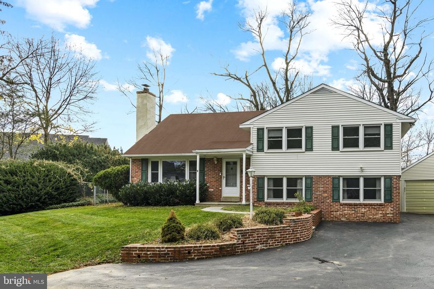 Sunday Open House Canceled. Offers due on Monday at 12noon. Seller in Pacific Time Zone. Response date of 2/14 please. 
Home has been VIRTUALLY STAGED.
Welcome to 548 Kromer Avenue, a private oasis situated at the end of a private driveway with fully-fenced-in amazing outdoor space which buffers the home from surrounding homes. This spacious split level has been improved and updated by the current owners. Once in the home's courtyard you will be stunned by the front and side yards and the more than ample parking for your guests. Enter the split level to the main living area and notice immediately the new Vinyl Plank Flooring of the highest quality and durability (6.5mm thick and a 20mm wear rating -do your own research to appreciate the importance!) The Vinyl Plank continues from the Living Room to the Dining Room, Kitchen and the lower Family Room level. The living room features abundant light, a wood-burning fireplace with receptacles to mount a TV over and recessed lighting.  From the LR the home flows through to the Dining Room with large bump out window and a slider to a patio and the amazing rear yard. The kitchen was remodeled in the past 2 years and boasts the open concept, a large white island with counter seating for at least 3 stools, additional perimeter cabinets in white and tall oak cabinets that extend to the ceiling. White quartz counters, glass subway tile backsplash and lots of recessed lighting make a bright space to prepare family meals or large gatherings. The appliances are all newer stainless steel models of the highest quality. Dishwasher has the stainless steel inside, the refrigerator is a French Door style refrigerator with water and ice on the door. The exhaust fan over the gas-cooking range fully vents to the exterior. There is a water filtration faucet separate from the kitchen sink faucet. Take a few steps up to the first bedroom level and you will find a spacious landing and note that the newer carpet that is in fantastic shape and feels so plush under foot. This level has an updated hall bathroom, the main bedroom with an updated ensuite bathroom, and two generously sized additional bedrooms. Up another set of stairs (ceiling heights are all comfortably high) and you will find an oversized room that can be used for another bedroom, playroom or multi-function room. This level also has an amazing amount of closet space that should not be missed. There is a large walk-in closet and a hallway closet before entering the fourth bedroom. A few steps down from the main living area you will find a large family room, or two room that can be configured for your family's needs (family room, workout room, office or craft room are a few ideas.  This level has a powder room, a large mudroom, laundry area as well as the mechanical room. The mechanicals are all newer in the last 2 years: the home was converted to natural gas from oil and thus the boiler and the hot water heater are newer. The new boiler created three zones of heat for the home to enable your greatest comfort.  An oversized two-car garage is just steps from the mudroom, and offers fantastic storage space for your cars and all the family's gear! The neighborhood surrounding 548 Kromer Avenue is just fantastic. It is always one of the favorite neighborhoods around when it comes time for holiday events such as Halloween Trick or Treating (streets are flat and houses are not that far apart) or Christmas when everyone puts out luminaries to light Santa's way and other community events (once we are post Covid). The home is a quick 7-minute walk to the Berwyn Train Station and all the wonderful restaurants and shops of Berwyn with many more to come with all the building activity taking place in downtown Berwyn.  Only a job change/relocation makes this fully updated home available to the market. Public records are inaccurate.