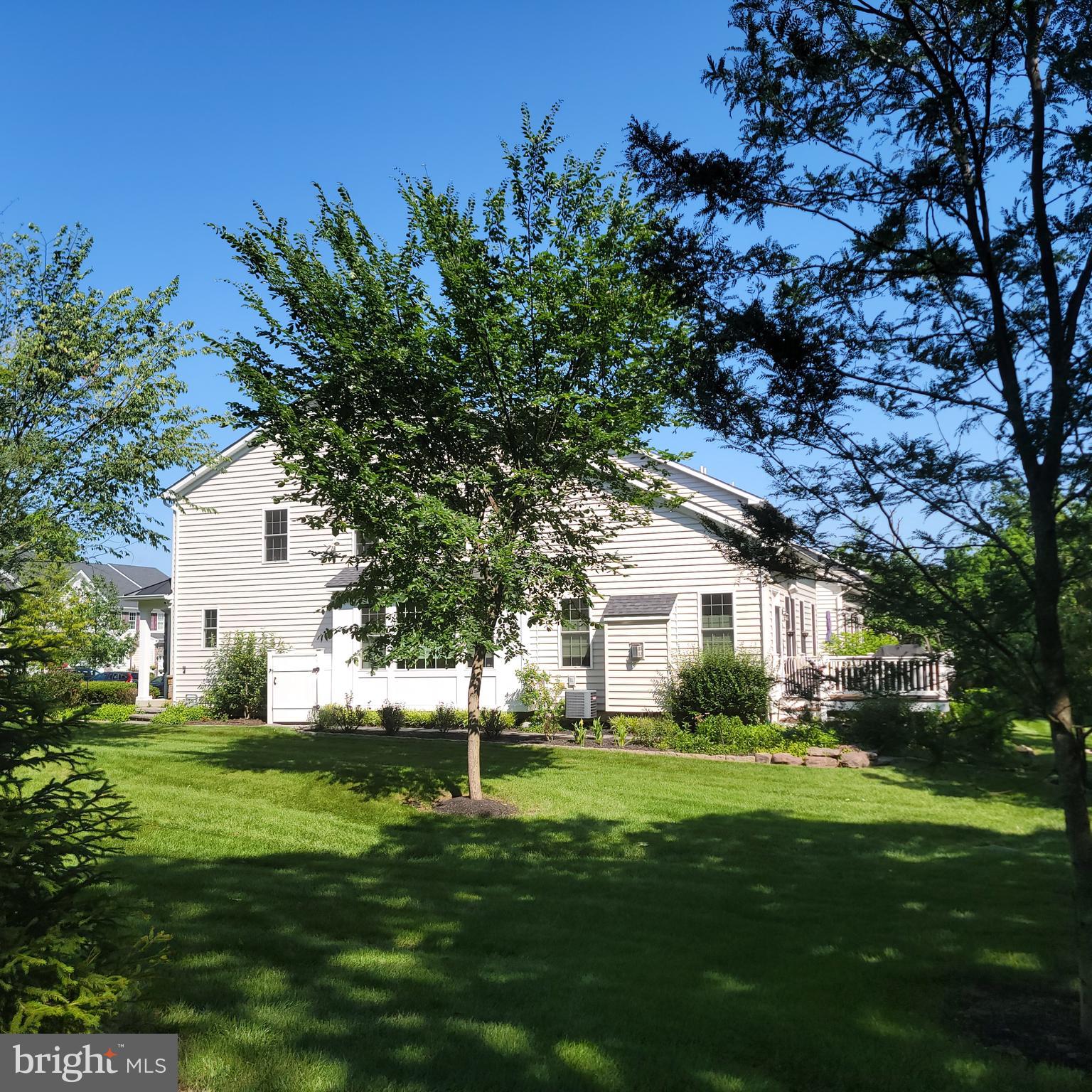 This immaculate end unit, cul-de sac townhome is luxurious and ready for you to call your own! This home has an oversized 2 car garage, rear deck, side yard with sidewalk, landscaping and view of the tree lined trail. In the heart of Colmar with easy commute options with the train, Route 309, and the turnpike access. Enter the warm, bright foyer to a modern feel with rich hardwoods, high ceilings, 1st floor main bedroom suite with a fabulous shower, extra large walk in closet tucked away from the kitchen. The kitchen boasts an island, stainless steel appliances, beautiful granite and open view of the floor to ceiling stone fireplace. The lower level is where all the fun begins! A professional style gym room, bar and rec room! Full bathroom with stall shower, mechanical room with HVAC humidifier and hydro back up, top notch security and wi fi / network system in closet. The upper level is spacious with three additional bedrooms, large closets and a full bathroom with tub. Bedroom 2 boasts built in window seat and storage for play things and built-in closets by design touches. This home has so many features that they are too many to list! Over $110k of upgrades when the home was purchased from the builder! This will not last long!