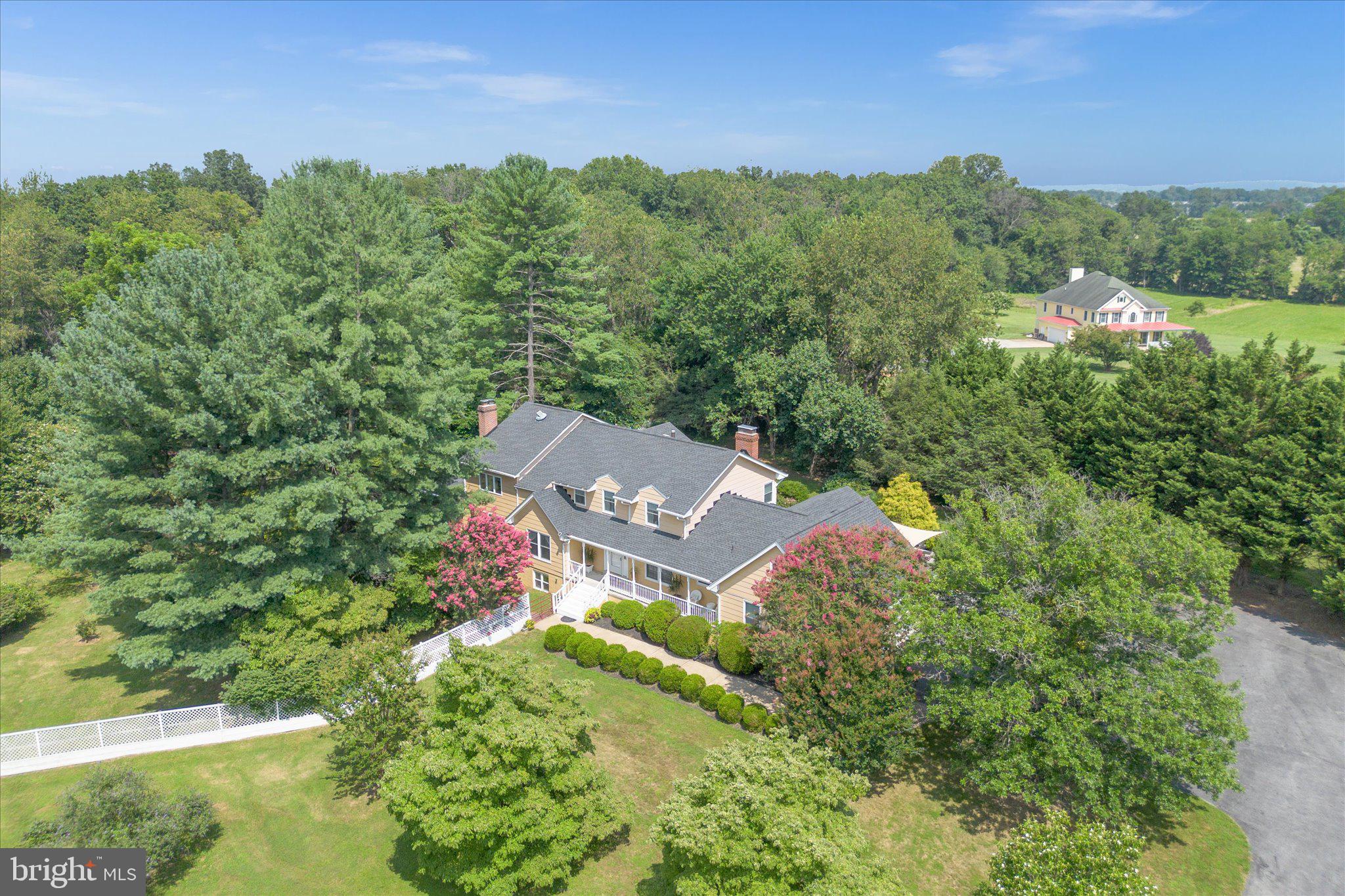 Sprawling 10-Acre Estate in Purcellville, VA – 12 Bedrooms– Endless Possibilities!
Welcome to this exceptional and expansive estate nestled in Purcellville, Virginia. Boasting over 7,000 square feet of finished living space, this fully handicap-accessible home offers 12 spacious bedrooms, 6 full bathrooms, and a rare combination of residential comfort and commercial potential.
Perfectly suited for multi-generational living, a retreat center, assisted living, rental income, or business use – the commercial zoning allows for flexible opportunities.
Main Level Features:
Bright and open kitchen with an oversized walk-in pantry
Inviting dining room with a cozy fireplace
Sunroom, perfect for year-round enjoyment
Office/study
4 bedrooms and 2 full bathrooms
Main-level laundry room
Upper Level:
5 bedrooms, 2 full bathrooms, and a convenient kitchenette
Additional laundry access for ease
Lower Level/Basement:
3 bedrooms, 2 full bathrooms
Functional kitchen and kitchenette and large living space
Separate laundry area
Separate entrance
Outdoor Highlights:
10 private acres with professional landscaping and fruit trees
Playground area and 3 fenced-in acres
Whole-house generator ensures comfort and safety in all conditions
Newer roof (2020), water heater (2023), and HVAC (2013)
Unbeatable Location:
Walkable to Mountain View Elementary and Woodgrove High School
Tranquil, rural setting with convenience to local amenities and wineries
Whether you're looking to invest, host, or simply live large in Loudoun County, this extraordinary property is a rare find that combines scale, comfort, and opportunity.
Schedule your private tour today and explore the endless possibilities of this unique Purcellville gem!