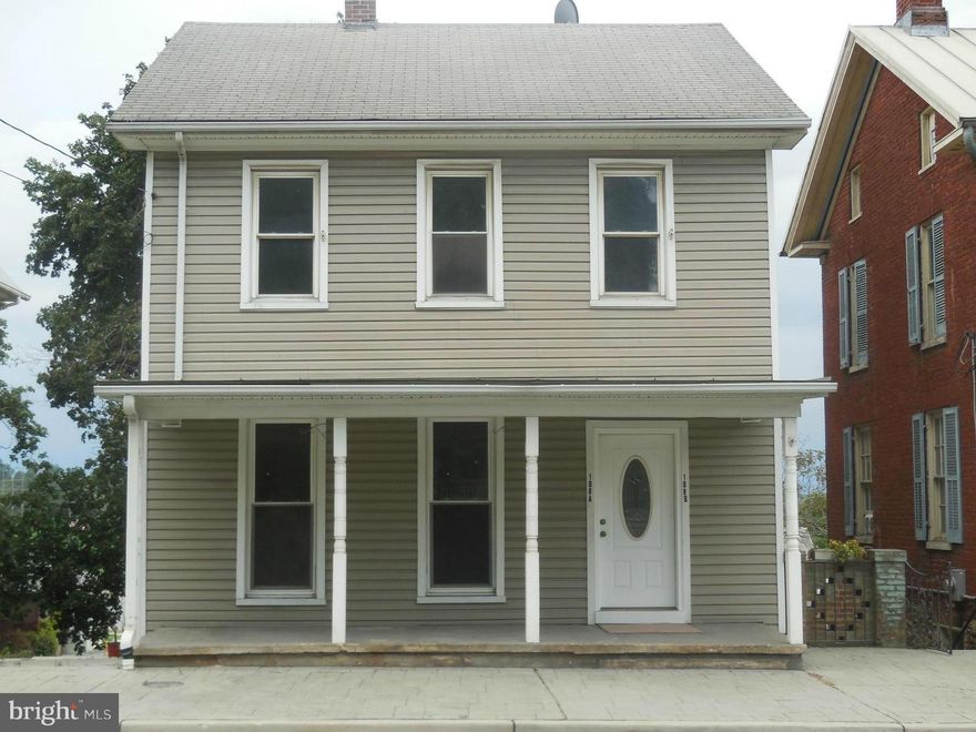 Back on the Market! Double Delight with historical appeal in this spacious home!  Live in one, rent the other, rent both, or easily use as single fam. Maint free ext. 2 washers, 2 dryers, stand-up freezer, 2 FULL oil tanks, new carpet and paint. Sep meters, central air, cable ready.  2 BR on 1st floor, 3 on 2nd. 2 kitchens, 2 BA.  2 car garage with elec. Yard with garden. Lead-free cert.