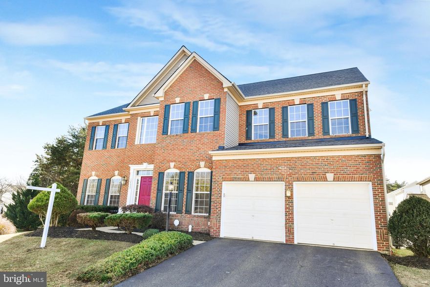 OPEN HOUSE SATURDAY & SUNDAY!  Backing to woods with common area on one side, this stately brick colonial offers a desirable setting within popular Broad Run Oaks!  Relax on the extensive Trex decking & watch your loved ones walk to the community pool just moments away or play in the privacy fenced backyard.  Many appealing interior features....Oversized center island kitchen with Smart Hub technology, main level hardwoods, 10' ceilings.  Finished, walkup lower level boasts a recreation room with bar 'nook', exercise room (possible media room), full bath, game area and plenty of storage.  Incredible primary suite with huge walk-in closet (two separated sections), private luxury bath & sitting room with surround speakers and projection TV!  Freshly custom painted interior, updated HVAC & new roof!