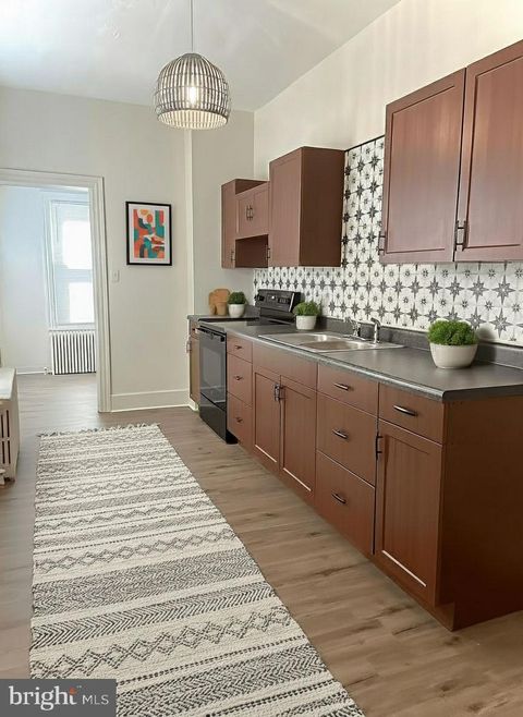 Photo of 424 Locust Street, READING, PA 19604 (MLS # PABK2063178)