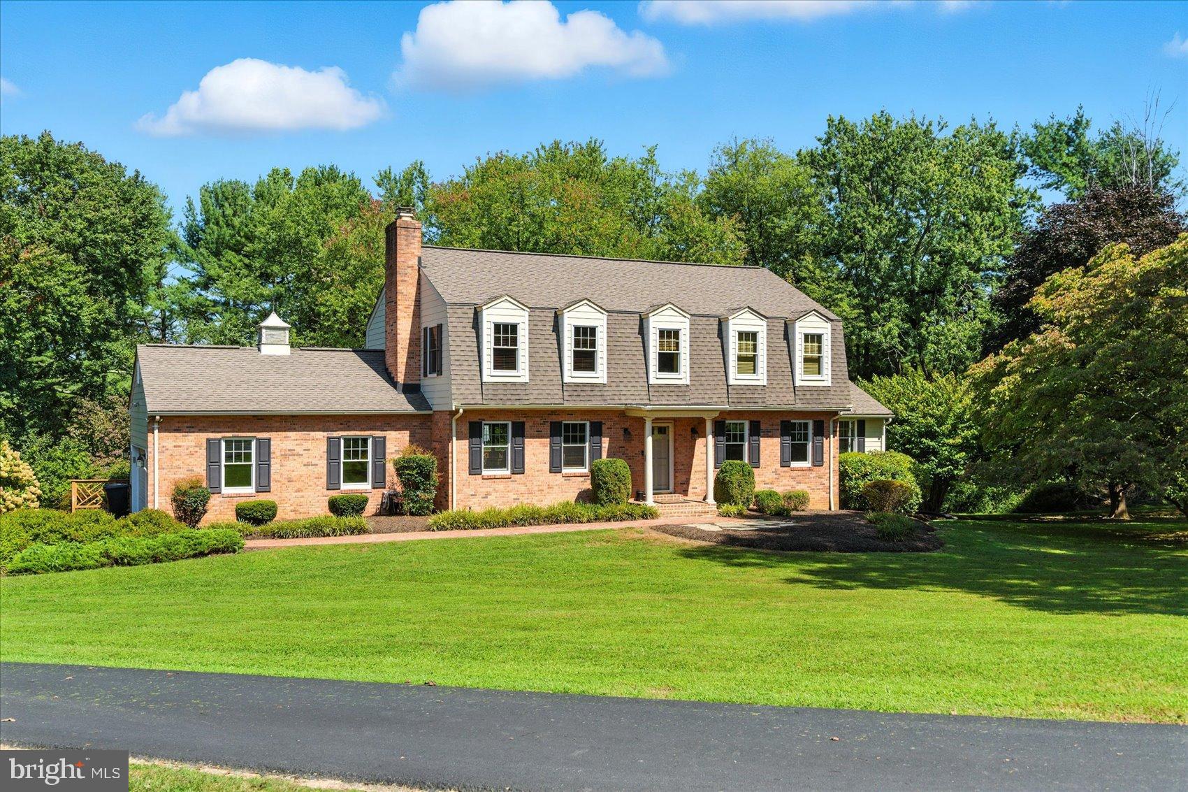 Nestled in the prestigious Blenview community, this exquisite Colonial-style residence offers a perfect blend of timeless elegance and modern comfort. This meticulously maintained home is set on a sprawling 1.89-acre lot, providing an oasis of tranquility and space for outdoor enjoyment. The classic brick façade exudes sophistication, while the side-entry garage and expansive driveway invite you to explore the beauty within. Step inside to discover a thoughtfully designed layout that seamlessly connects living spaces, perfect for both intimate gatherings and grand entertaining. The heart of the home features a spacious living area bathed in natural light, vaulted ceilings and a beautiful stone fireplace, creating a warm and inviting atmosphere. The well-appointed kitchen is a culinary enthusiast's dream, offering ample counter space and storage, making meal preparation a delight. The formal dining room with crown molding and chair rail, along with a versatile den/office featuring its own brick fireplace, make this home great for entertaining and perfect for today's lifestyle. Gleaming hardwood floors flow throughout the main and upper levels. Upstairs, four generously sized bedrooms provide comfort and privacy, including a luxurious master suite complete with an en-suite bath boasting elegant finishes and ample space for relaxation. The additional bedrooms offer versatility for guests, a home office, or a personal sanctuary. The fully finished lower level adds significant value, showcasing a newly finished in-law suite complete with its own entrance, full bath, washer & dryer, kitchenette, and a spacious bedroom with a walk in closet, perfect for extended family, guests, or multi-generational living. Outside, the expansive grounds are a canvas for your imagination. Envision summer barbecues, serene evenings under the stars, or simply enjoying the beauty of nature in your own private sanctuary. The property's generous lot size allows for endless possibilities, from gardening to outdoor activities. Located in a sought-after neighborhood, this home offers not just a residence but a lifestyle. Enjoy the peace of mind that comes with living in a well-established community, while being just moments away from local amenities and recreational opportunities. This exceptional property is more than just a house; it's a place to create lasting memories and embrace the joys of life. Experience the perfect blend of luxury and comfort in this stunning Blenview home, where every detail has been crafted with care.