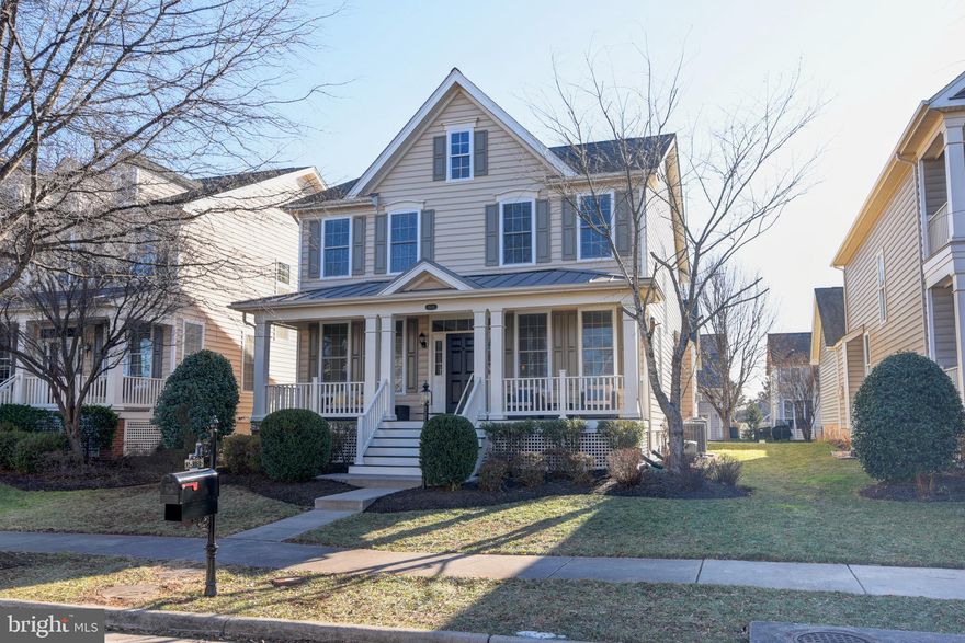 Beautiful home nestled in the vibrant Dominion Valley community, it has everything you need to live comfortably and stylishly. Custom built screened porch and deck. Gleaming hardwood floors throughout main level. Fully finished basement with 5th bedroom, full bathroom, game room and media room. Professionally painted from top to bottom and move-in ready. RECENT UPDATES: BRAND NEW CARPET, BRAND NEW KITCHEN APPLIANCES, recessed lights and light fixtures 2025, roof 2024, furnace and A/C 2023, water heater 2023, heat pump 2022, screened porch and deck 2022, basement bedroom 2020, basement bathroom 2020. Over $130K in upgrades in the last 4 years! Dominion Valley is a resort style gated community with many amenities: Arnold Palmer Signature Golf Course (memberships available to residents), country club, 4 outdoor pools, indoor pool, sports pavilion, exercise facility, walking trails, fishing ponds, parks, tennis courts and more.