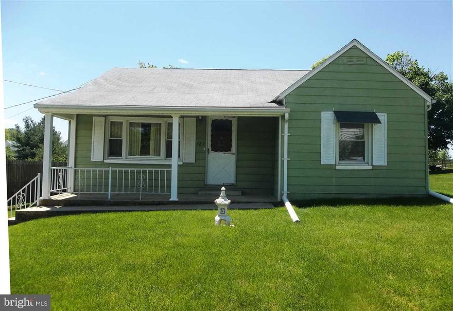 Cute as a button!  2 Bedroom, 1 bath single family home on .4477 acre with private driveway just minutes to I-83 in Dallastown Schools. Fresh paint throughout! Eat-in Kitchen, Living Room with bay window, wood floors and built-ins, spacious bedrooms with wood floors and large closets. Lower level has utility, laundry, workshop area, storage cabinets and walkout to rear yard.  Covered front and rear porches, public utilities, shed, mature trees!