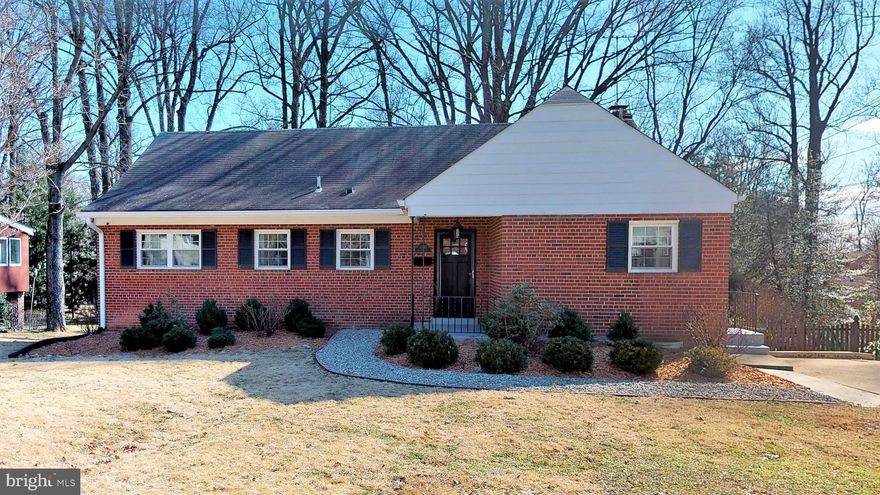 Free home?? Of course not! But the next best thing is the exciting value you will discover in this smartly remodeled 4 Bedroom, 3 Bath home located in popular Sleepy Hollow Manor. The bright and spacious kitchen is a lovely recent renovation with a 9 foot center island, granite counter -tops, gas cooking, stainless steel appliances, shaker-style cabinetry.  It is bright and pretty and big...where everyone gathers, right?? The family room is encased with a wall of windows overlooking the large back yard. The expansive walk -out lower level is perfect for relaxing, and large gatherings. There is a large bedroom and newly remodeled bathroom for guests or as it is currently used, a private master suite. The lower level bathroom has been totally remodeled. The great room is filled with light from the 2 rear bay windows. The main floor offers a large formal dining room with wood-burning fireplace, a sun-drenched family  room with access to the rear yard and private patio.(flat screen TV too!!)  Terrific neighborhood and central location...add a currently stylish home and you will be happy to call it home.