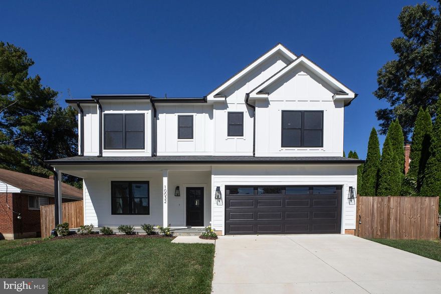 New home completed in 2024! Enjoy a covered front porch entry into this stunning residence with an open floor plan showcasing gorgeous hardwood flooring throughout. The spacious kitchen features an island with a waterfall countertop, perfect for entertaining, and flows seamlessly into the inviting family room with a cozy gas fireplace. A separate dining and living room complete the main level.

Walk out to a fully fenced rear yard and a beautiful stone patio, ideal for outdoor living.

Upstairs, the primary suite offers a tray ceiling, walk-in closet, and luxurious en suite bath. The second level also includes three additional bedrooms, two full baths, and a generously sized laundry room.

The finished lower level boasts a large recreation room with a wet bar, an additional bedroom, and a full bath, providing the perfect space for guests or extended family.