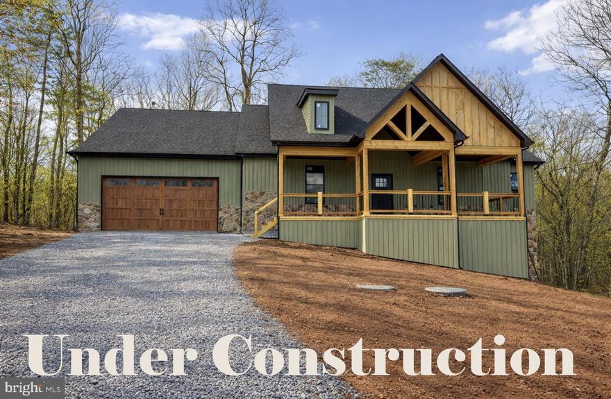 Late summer delivery!
This beautifully designed 4-bedroom, 3.5-bath home offers the perfect blend of elegance, comfort, and functionality in a peaceful, wooded setting. The exterior highlights a stylish mix of stone and siding, creating a timeless and elegant curb appeal. Highlighted interior features include a split-bedroom layout with a spacious primary suite that includes dual primary bathrooms — each with its own shower, sink, and toilet. The open-concept living area highlights a partial stone fireplace with shiplap accent, a formal dining room, and a dedicated office complete with built-ins. The kitchen will feature a large island, Quartz countertops throughout, and a stainless steel kitchen appliance package. 
Upstairs, the loft provides an additional bedroom and bathroom. The unfinished basement with combo safe room offers plenty of potential with a walkout to the backyard and storage. Enjoy outdoor living on the beautiful Sunroom and 8 x 24 composite back deck or relax on the welcoming front porch, surrounded by mature trees for privacy and serenity.
Hospital less than 5 minutes away and just minutes to Cacapon Resort State Park where residents can enjoy access to golf, dining, walking trails or visit downtown Berkeley Springs and more. Don’t miss your chance to make this incredible new home yours!

Under Construction close to hospital & amenities.

"Please note: The photos shown are of a similar completed home. The specific home may vary in floor plan, finishes, or upgrades. The builder reserves the right to substitute materials that may not be available to avoid delays."