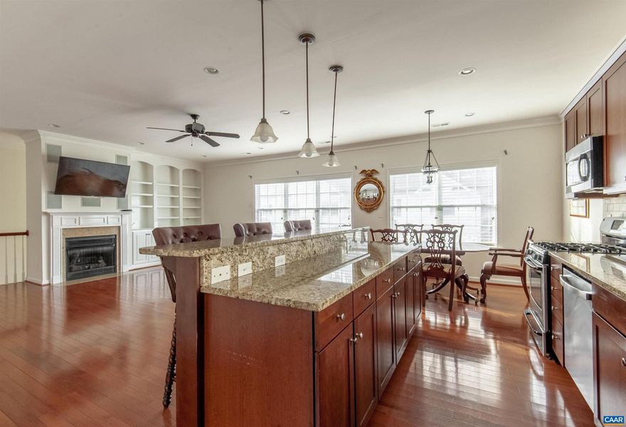 MODERN TOWNHOME IN SOUGHT AFTER BELMONT OFFERS PRIME LOCATION TO EVERYTHING DOWNTOWN CHARLOTTESVILLE!�This contemporary 3BR & 2.5BA townhome features an open concept kitchen, living and dining area flooded with natural light. Expansive eat-in kitchen with granite countertops, large island, stainless steel appliances is perfect for modern day living and entertaining. Main living area provides hardwood floors throughout with a charming gas fireplace. Large master suite provides private bathroom and walk-in closet. Townhome boosts a 2-car garage and deck off the kitchen. Minutes to everything Belmont & Downtown Charlottesville have to offer; fabulous restaurants, shopping, entertainment, UVA (10 minutes), parks, Rivanna River, and much more!,Granite Counter,Wood Cabinets,Fireplace in Great Room