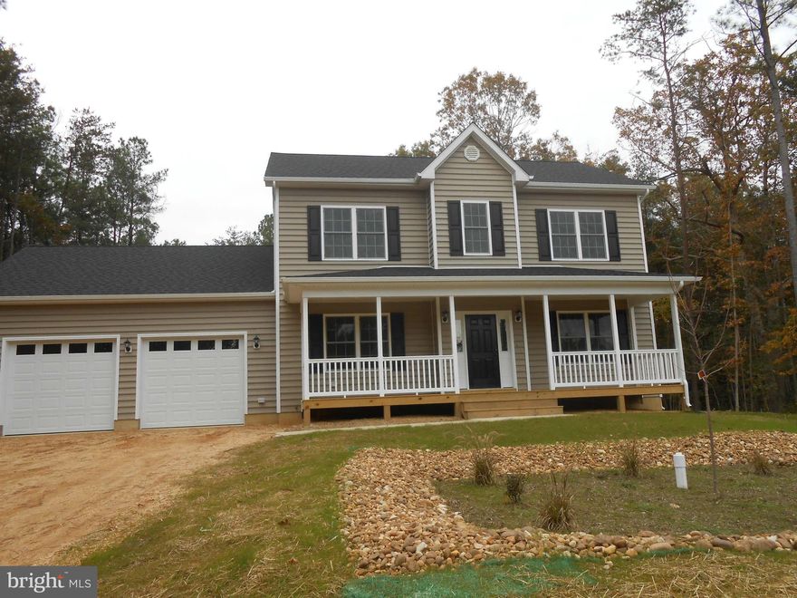 Brand new and ready to be moved into. BEAUTIFUL Colonial on a very private and level lot. Oversized 2 car finished garage, tilt out windows, front porch, 1982 square feet finished. 3 bedroom 2 .5 baths,  very very nice.