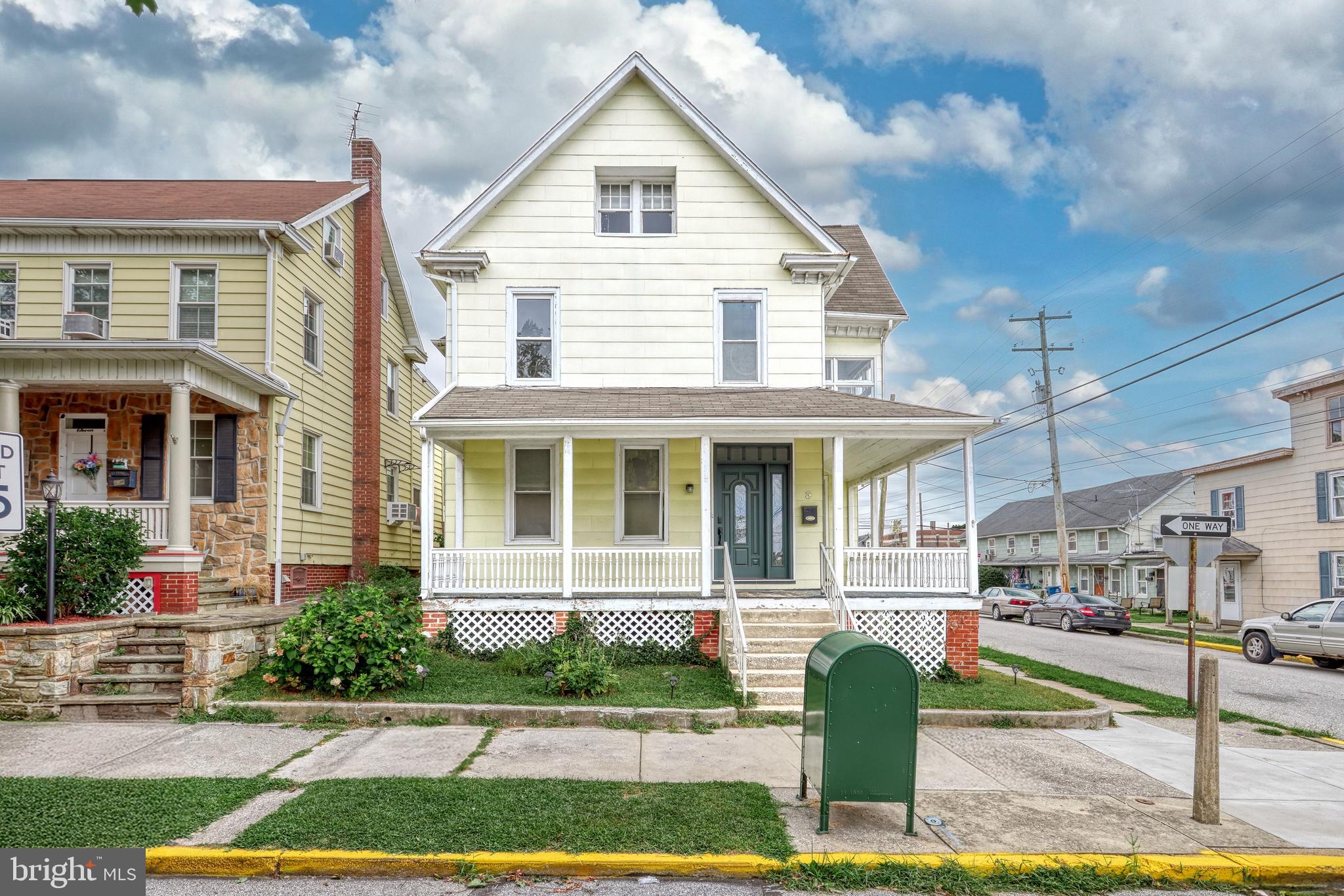 This expansive Victorian home offers timeless charm and modern potential. Boasting 4 spacious bedrooms, 2 full bathrooms, and generous square footage across three stories, this property sits proudly on a corner lot with a picturesque wraparound covered porch.
Located near schools, shopping, and major commuter routes to York, Hanover, and Maryland, the home is ideal for both owner-occupants and rental tenants alike.
Currently configured as a single-family residence, the property was previously a two-unit and retains key features for easy conversion: separate entrances, dual living areas, and space for a second kitchen. Whether you’re looking to restore its multi-family setup for passive income or keep it as a large single-family home, this property offers flexibility and significant upside potential.