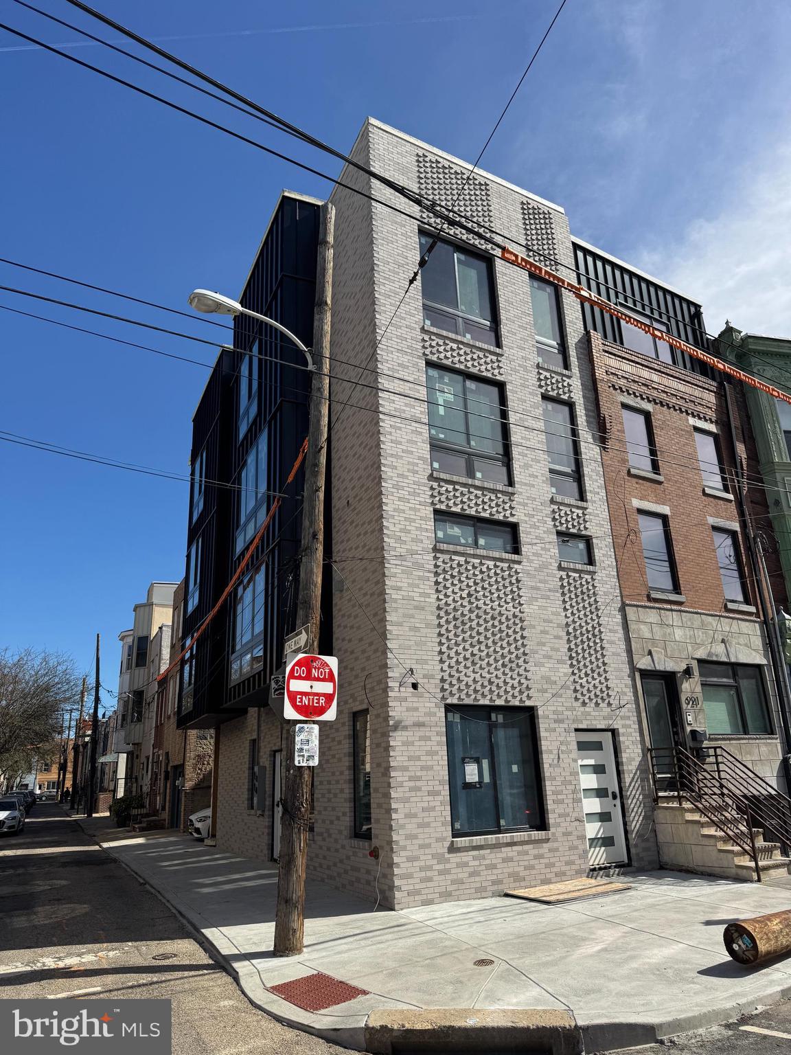 Welcome to this stunning brand-new construction corner property in the desirable Bellavista neighborhood of Philadelphia. This property features two beautifully designed units, both offering modern luxury and spacious living. The lower unit is a three-bedroom, three-bathroom home spread across three levels, including a first floor, basement, and second floor. With abundant natural light throughout, this unit offers a bright and airy atmosphere, perfect for everyday living. The spacious layout is ideal for entertaining, with high-end finishes and plenty of room to relax. The master suite includes a large, luxurious bathroom for added comfort. The top unit also boasts three bedrooms and three bathrooms, with an impressive large roof deck offering breathtaking skyline views—an ideal space for outdoor entertaining or unwinding. The master bathroom in this unit is equally expansive and luxurious, featuring high-end fixtures. Like the lower unit, the top unit enjoys great lighting and top-tier finishes, combining style and functionality. Both units are perfect for those seeking a blend of luxury, space, and prime location in one of Philadelphia’s most vibrant neighborhoods. THERE IS STILL TIME TO WORK WITH BUILDERS ON SOME FINISHES