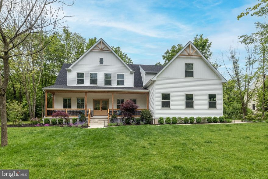 1 year young! Built in 2023 on an acre in the heart of Bucks County - Wellington Estates is a picturesque neighborhood in Buckingham Township. This stunning Farmhouse-style colonial with beautiful modern finishes offers 4 bedrooms with a first floor office or additional bedroom and full bathroom on the first floor. The unique floorplan is an entertainer's paradise, boasting 3,500+/- sq.ft. of bright, open living space. This impeccable residence has a flowing layout that exudes warmth and sophistication. A covered front porch with custom railings and recessed lighting in the pine ceilings leads to a double door entry, opening into warm, sophisticated spaces with 9-foot ceilings and wide plank luxury laminate gracing the floors. Lots of windows with custom window treatments, including plantation shutters downstairs and Levelor blinds upstairs, fill the home with light. The Living Room features a gas fireplace with stone surround, with easy access into the Dining Room. An expansive eat-in kitchen showcases stainless steel appliances, center island with seating and a large farmhouse sink, granite countertops, and a custom tile backsplash. A separate coffee bar in the breakfast area has an undercounter beverage cooler, and sliding glass doors lead to the large back yard. Retreat upstairs to the grand primary bedroom suite, with recessed lighting, a huge walk-in closet with organizers. The luxurious primary bath offers a soaking tub, large shower with double shower heads, separate sinks/vanities, and a spacious linen closet. Another beautiful bathroom is shared by 3 generously-sized bedrooms, which are well appointed with ceiling fans, recessed lighting, and large windows. The laundry room is conveniently located on the upper floor. Should more living space be desired, the basement is framed and insulated. Additional highlights of this exceptional property include an oversized 2-car garage, an automatic whole-house generator, custom closets and pantry, custom laundry room, whole house humidifier, Reverse Osmosis drinking water system, front landscaping with lighting, custom glass showers doors in all full bathrooms (3), interior freshly painted, Leaf Filter Gutter Guards, and a radon reduction system. Easy access to major commuter routes to NY, NJ and Philadelphia. Enjoy award-winning Central Bucks School District. Just minutes to area parks for biking, hiking and boating. Nearby shopping, dining and cultural events in Historic Doylestown. Don't miss this rare opportunity to own a truly extraordinary home that offers the perfect blend of luxury, comfort, and entertainment!