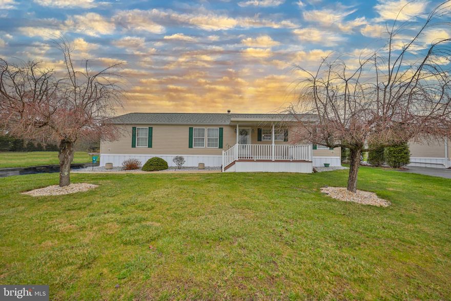 NEVER JUDGE A BOOK BY IT’S COVER . . . Prepare to be ”WOWED” the moment you step into this spacious 3-BR, 2 BA ranch home located in the community of Northside Heights. This Champion “Gold Medal” home is loaded with almost every upgrade available! The open floorplan, stone propane fireplace and built-in cabinetry welcomes you the moment you walk into the home. Custom kitchen features a wood hearth electric cooktop, double ovens, 8' center-island with stainless sink that seats 3 and stainless appliances! An oversize master bedroom & master bath includes garden tub, double vanity sink, 48" stand up shower & walk-in closet. 2 equally size bedrooms and full bathroom on the opposite side of the home for your privacy. WELL MAINTAINED! Roofs replaced on home in (2018) Garage & shed (2020), toilets replaced with 18" high toilets and new kitchen faucet are a few of the recent improvements to the home. A covered (10' x 13') front deck, detached (14' x 30') garage and (12' x 20) shed, both with electric are added bonuses! Included with the sale of the home is a Craftsman tractor, snow blower, patio set with chairs and wood sleigh bed, dressers located in the master bedroom.  $520/mo. lot rent incl., W/S/G & community pool and other amenities. BUYERS: Please make sure you're approved for manufactured home financing. VA, FHA, USDA or Conventional mortgages will not qualify for these homes. Call listing agent with any questions. Call today!