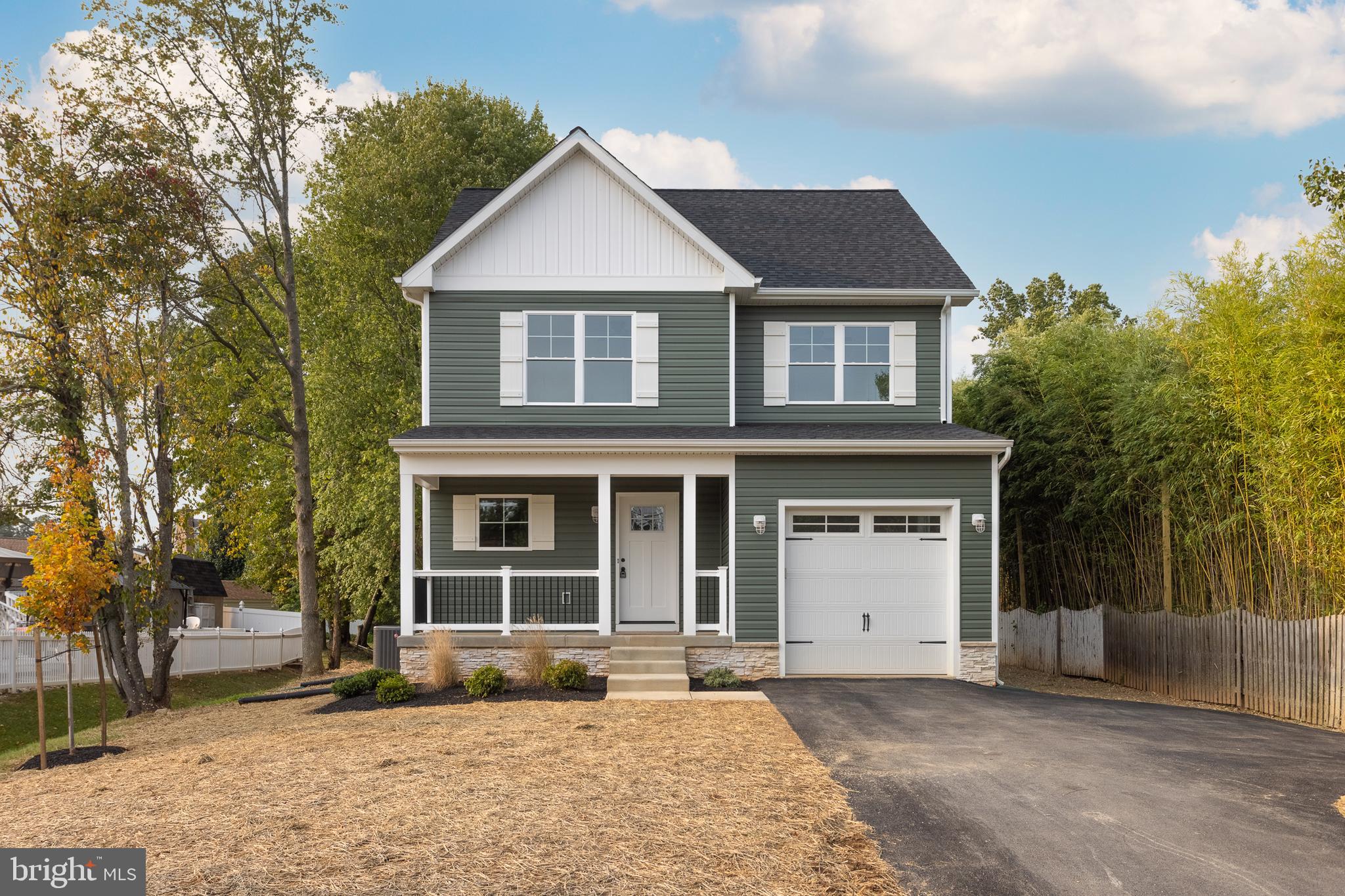 Rare opportunity to own a brand-new custom-built home in the desirable Oliver Beach community. This 4-bedroom, 3.5-bath home with attached garage makes an immediate impression with its striking exterior contrast, stone accents, and fresh landscaping. Inside, the foyer features a large coat closet and a custom built-in cubby for storage, and opens directly into the beautiful kitchen, dining, and living areas. The open-concept design fills the main level with natural light and provides views of the oversized backyard and large deck. The kitchen is a true highlight with a bold center island, white cabinetry, stainless steel appliances, gold hardware, and coordinating lighting that ties the space together. Durable luxury vinyl plank flooring and recessed lighting flow throughout the main level and the living room stands out with a striking fireplace framed by a shiplap accent wall. Upstairs, the primary suite offers a large walk-in closet and spa-like bath with a tiled walk-in shower. Two additional spacious bedrooms share a full hall bath with double vanity. The finished basement extends the living space with a versatile rec room, full bath, and a fourth bedroom. In a prime location with just steps from Gunpowder Falls State Park with trails and water views and Dundee Creek Marina. Highly desirable area and move-in ready, book your showing today!!