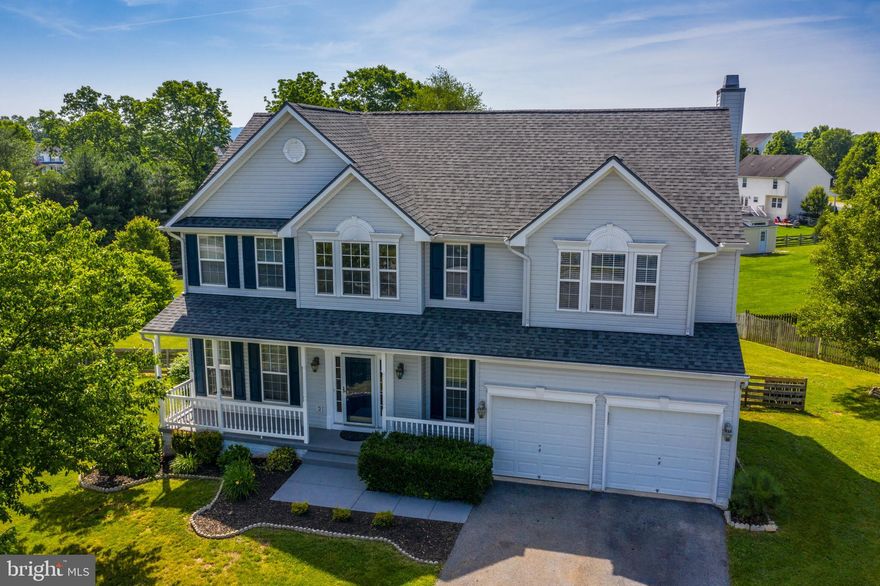 Take a look at this gem sited on an awesome cul de sac lot with large level rear fenced yard. Walk out of the finished basement onto the large patio and "basketball area" or exit off your kitchen onto a corner deck that transcends to the rear yard.  The front porch says "Hello, Come on in". Inside you will find formal DR and LR, large extended eat in kitchen with island and bar seating attached to a great family room with wood burning fireplace highlighting the far wall.  The upper level has a great master suite and 3 additional bedrooms plus 2nd bath and the lower level is finished for family entertainment, game night, play room, additional sleeping quarters with another full bath! A 2 car attached garage completes the package! Don't waste time thinking on this one!!!