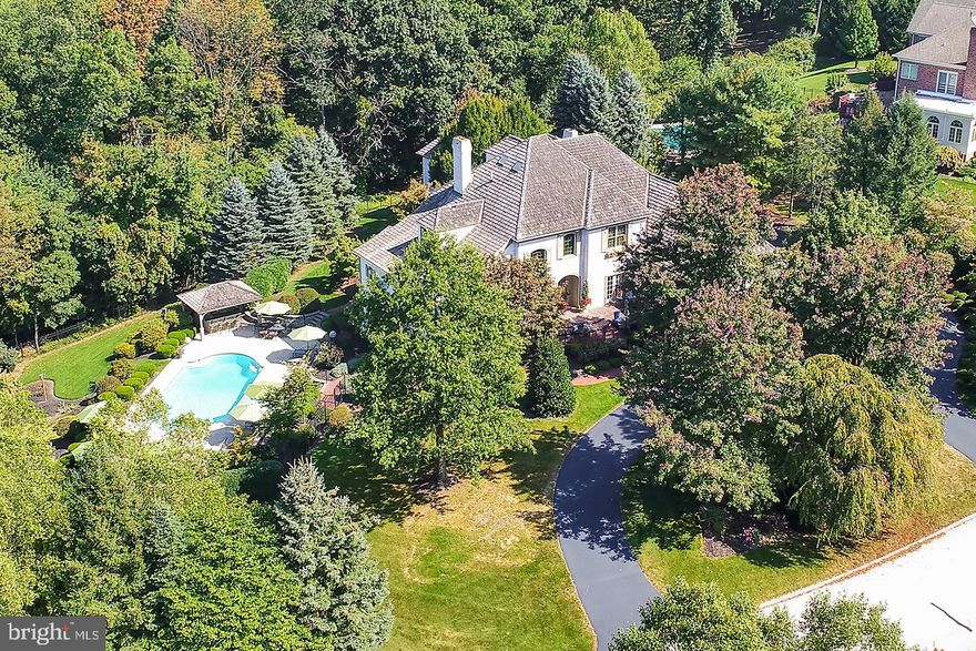 Gracious Elegance describes this stunning home on 2.1 acres in Deer Chase Estates. The home features the finest quality craftsmanship and attention to detail with an open flowing floor plan perfect for day to day living, entertaining and private guest accommodations. First Floor Master Suite.  The home is all brick with a custom design treatment to the bricks creating an 'Old World Design".  The outside entertainment areas are outstanding offering a large in-ground pool surrounded by stone pavers, outdoor cooking Cabana and Bar.  Perfectly located near hiking trails, schools, shopping and I83.  Dallastown Schools. This home is a true paradise.