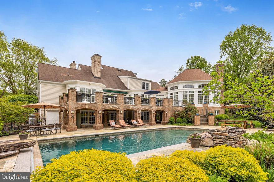 This sophisticated Southern Living property embodies luxurious outdoor living and entertaining. Settle in and celebrate the start of summer in the coveted Ivy Reach community! Host your first party alongside the stunning heated saltwater pool (complete with a retractable cover, stone fountain, and stone diving board), surrounded by Travertine decking and a built-in hot tub. Get some shade under the covered patio, where you can relax while your favorite music pipes through the speaker system, then duck into the outdoor shower to be fully refreshed! 

Designed for entertaining, your guests can access the walkout finished basement from the pool area or take the bluestone steps up to the second tier of the outdoor living space, an expansive Travertine deck with space for a crowd and a gorgeous view of the grounds! Benefit from the privacy and beauty of the owner's investment in extensive hardscaping, professional landscaping, and fencing of the backyard. 

This property provides 6,800 square feet of beautiful finished living space. If you've been seeking a luxury home with the highest caliber of construction that's completely turnkey, you've found the one! Beaming with natural light, lovely millwork, custom built-ins, four Rumford fireplaces, and a fantastic floor plan design with rooms that are just the right size. The crown jewel of the interior of this home is the jaw-dropping timber-framed sunroom. This sun-drenched space is simply spectacular, and it will be so cozy to curl up here next winter alongside the floor to ceiling stone fireplace. 

Other top features of this home include the bright great room with a vaulted ceiling and yet another charming fireplace, and the chef's kitchen which is complete with stainless appliances, quartz countertops, double ovens, and a 6 burner gas cooktop. The main level owner's suite has 2 walk-in closets and a renovated en-suite bath with heated flooring, an oversized double vanity, and a jacuzzi tub.  

The finished basement lends itself to a variety of usages - the additional kitchenette creates an opportunity to use this as an in-law or guest suite - and with walkout access to the patio, outdoor shower, and pool, it's a natural extension of your entertaining space! This property truly has it all - you and your guests will enjoy a game room with a fireplace and wet bar, a fitness room, and a large space that is ready to be finished off as a theater room (this space is located under the sunroom - all the systems and wiring are in place, just add your preferred cosmetic finishes). 

This home has been maintained fastidiously. Recent system and appliance updates include the water heater, HVAC for the main and second floors, all kitchen appliances, and the washer/dryer. Contact your agent for the full list of upgrades classified by year. 

Your entertaining paradise awaits! 

**Be sure to check out the video!**