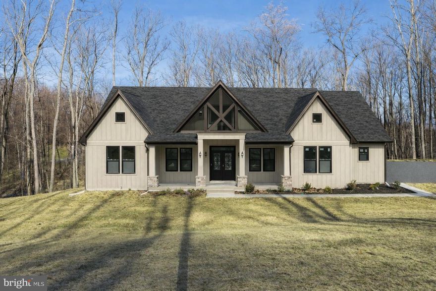 May/June 2026 delivery!!!!   Home with 2 +/-  acres situated in the new community of Hallmark Glen!!

Impressive homes in this community offers privacy and convenience for commuters and access to amenities. This home fits perfectly and will include the following: 4 bedrooms with 4.5 baths and an office or flex room.

Ranch craftsman style home with Hardie board siding and includes a 2 car side load garage with painted floor. Quality construction nicely upgraded with full kitchen appliance package, quartz, luxury vinyl plank flooring, soft close cabinets, vaulted ceilings & more. 

Priced to include 1000 square feet of basement with full bath.

Some pictures are of a similar home already constructed.