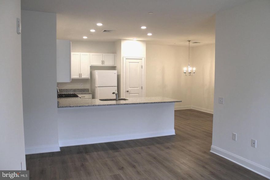 Welcome to The Residences at Brookhaven Glen, Delaware County, new construction at its finest! 
Unit 612 is a first-floor unit with tasteful finishes throughout. Beautiful 9 foot dramatic ceilings make this floor plan seem even more spacious! Kitchen is white and includes a stainless refrigerator, dishwasher, microwave and stove as well as a nice size pantry.  The living area is beautiful and has sliders to a lovely patio.  Off of the dining area is also a den or 3rd bedroom (and does include a door). The large master bedroom also has a great sized walk-in closet & a full bathroom with dual white vanity, double sinks, upgraded, ceramic tile shower & even a linen closet.  Generous sized second bedroom has a double closet. Full hall bath also has a white vanity with granite countertop. A full-size washer and dryer are also included in the condo.
 On-site amenities include a private dog park (to be ready soon), gorgeous courtyard with lovely landscaping includes water fountain and gazebo (with rocking chairs for your relaxation) and 2 pergolas with natural gas grills for your grilling pleasure. All buildings completely ADA accessible. Conveniently located just minutes from I-95, Route 1, the Blue Route, Media Boro, the airport and lots of shopping and restaurants!

*Community currently under the 80/20 rule, so these homes are also available to residents over the age of 18.