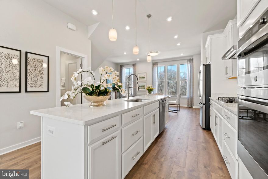 Brand New Stanley Martin Townhome at Arcola Town Center! 

Introducing our stunning 3-bedroom townhome, designed for the discerning homeowner. Step into the open-concept floorplan, where the spacious gourmet kitchen beckons with its large sit-down island, perfect for both passionate chefs and culinary enthusiasts. The generous family room and dining area complete this inviting space. Unwind in your private primary suite, boasting an elegant en suite bath and a spacious walk-in closet. This serene retreat will quickly become your favorite place to unwind and recharge. On the same floor, you'll find two additional bedrooms, accompanied by a full bathroom, providing comfortable accommodations for both family and friends. Need some extra space? Head downstairs to the lower level, where you'll discover a versatile recreation room and a full bath, offering endless possibilities. Whether you're entertaining guests or seeking a quiet sanctuary for work, this flexible space can adapt to your every need. Photos shown are from a similar home. Schedule your appointment or stop by today and tour our model home!

Outside your doorstep, you'll find a tot lot and neighborhood pool with a clubhouse. Directly adjacent to the neighborhood is the newly opened Elaine Thompson Elementary school. Everyday conveniences are just around the corner at Dulles Landing with Walmart, Dicks Sporting Goods, Bed, Bath & Beyond, Homegoods, and more. Additionally, there are many recreation options nearby with the new Hal and Bernie Hansen Regional Park and Dulles South Recreation Center just a short drive away.
Whether you're looking to upsize, downsize or purchase your first home, you will find a home that fits your lifestyle at Arcola Town Center.  Visit us today!