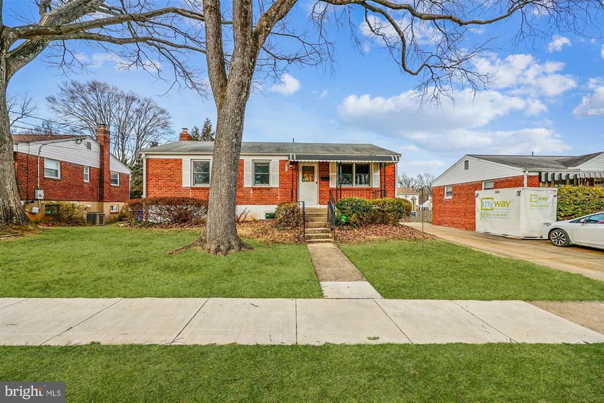 PERFECT FOR INVESTORS — AS-IS SALE. Don’t miss this spacious brick-front rancher offering 2,920 total square feet, located on a quiet street in sought-after Randolph Hills. This home features 4 bedrooms and 2.5 bathrooms, with a rear addition that expanded the living space and created the 4th bedroom along with a second full bathroom. The main level offers an L-shaped living/dining combination that flows into a large, table-space kitchen. The kitchen opens to an expansive family room with a wood-burning fireplace (condition unknown) set in a rustic brick surround. The kitchen and family room feature durable engineered flooring. The rear addition brings in abundant natural light with skylights and includes a washer/dryer, a full bathroom, and the 4th bedroom, plus a private entrance that opens to a walk-down deck with access to the backyard. Three additional bedrooms and a full bathroom complete the main level. The partially finished walk-out basement includes a huge recreation room, a half bathroom, and a large utility/storage area.Ideally located near shopping, dining, entertainment, parks, and major commuter routes, with top-rated Montgomery County schools adding to the appeal.