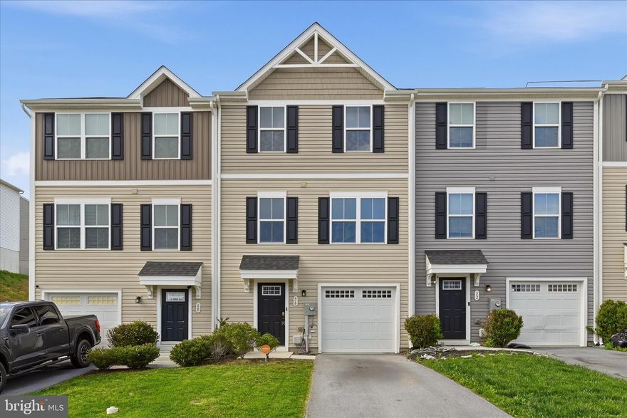 Like-new, fully finished 3-level townhome in the desirable Stonecrest community! This 3-bedroom, 2.5-bath home offers a spacious and functional layout. Enter through the foyer to a finished recreation room with walk-out access to a fully fenced rear yard—perfect for relaxing or entertaining. The main level features durable LVP flooring, an open-concept design, and abundant natural light. Enjoy a large living room, convenient half bath, and an eat-in kitchen with granite countertops, stainless steel appliances, and a dining area that opens to a rear deck with stairs leading down to the yard.

Upstairs, the primary suite includes a walk-in closet and private en suite bath. Two additional bedrooms share a full hall bath with tub/shower combo. Laundry is conveniently located on the bedroom level. Additional highlights include an attached 1-car garage and modern finishes throughout. Ideally located near major commuter route Interstate 81, offering easy access for daily travel. Move-in ready and waiting for you to call it home!