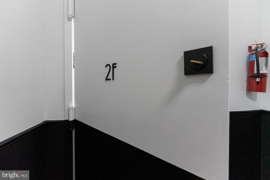 Welcome to 2118 Spruce Street. This grand, historic 5 unit multi-family is located in one of Philadelphia's most prime locations in Rittenhouse Square!  The entire building has just completed a masterfully done full renovation to highlight modern amenities, while still showcasing the character and history of the building.  The entry vestibule features original marble slabs and moldings with a new modern flora noir wallpaper. The lobby features black and white terrazzo tiles and black half walls along with original moldings. Unit 2 F features fantastic natural light through double height windows, high ceilings and spacious living area  , and a lovely Northern exposure  facing a quaint portion of a tree lined  Van Pelt Street. This one bedroom unit has been completed with beautiful refinished original hardwood floors, a brand new kitchen with quartz countertops, all new stainless  appliances and a newly tiled bath. The comfortable  bedroom in the rear of the unit away from the street has an abundance of closet space and storage as well as a window to the private backyard allowing great natural light into the room. In unit washer and dryer are included as well as a bike room in the basement.There is secure package drop off for deliveries as well as a security video intercom system to allow guests into the building from the apartment.  2118 Spruce is in one of the most sought after neighborhoods in Center City on a beautiful tree lined block and perfectly situated for all one may need and want within a short walk in any direction. Be the first person to live in this incredible and tastefully renovated building offering old world charm and modern amenities.