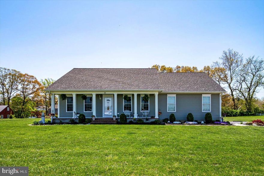 Welcome to 108 Bullet Run Drive. This gorgeous rancher sits on over 1 acre with lake views! Here you will enjoy a convenient but private location tucked back in a small community surrounding the lake.  As you walk up the this home, you will notice the mature landscaping all around.  The front porch is a breath of fresh air.  Large and open for you to sit and enjoy the gorgeous views of farmland.  As you enter the home your mouth will drop.  Stunning doesn't begin to describe this one!  Wide open floor plan, vaulted ceilings, LVP flooring, and a gorgeous stoned fireplace from floor to ceiling.   The kitchen is perfection.  Large island, granite countertops, a ton of counter and cabinet space, stainless steel appliances, and views of your gorgeous backyard and the lake.  One the right side of the home you have the owner's suite , laundry room, and 2 car garage.  The owner's suite is just the right size with a ton of natural light beaming in and views of the backyard and lake.  The owner's suite bathroom is stunning!  Double vanity, linen closet, large tile floors, soothing soaking tub and a stand up shower that is tiled from floor to ceiling.  The walk in closet is perfectly located right off of the bathroom.  The separate laundry room is large and offers the option for a stackable unit or a standard sized side by side washer and dryer and a wash sink.  On the other side of the home you have 2 very large bedrooms.  Each bedroom offers great closest space.  The hallway full bathroom boasts tile floors, vanity with granite top and a shower/tub combo.  Moving outback you will not be disappointed.  Large, composite deck with brand new pergola.  Sit out here and soak up your large backyard and gorgeous, calming views of the lake.  Finishing off this gorgeous home is the side loading 2 car garage with over sized driveway.  Plenty of parking!!!  With a super convenient, but private location, this home is everything you have been waiting for.