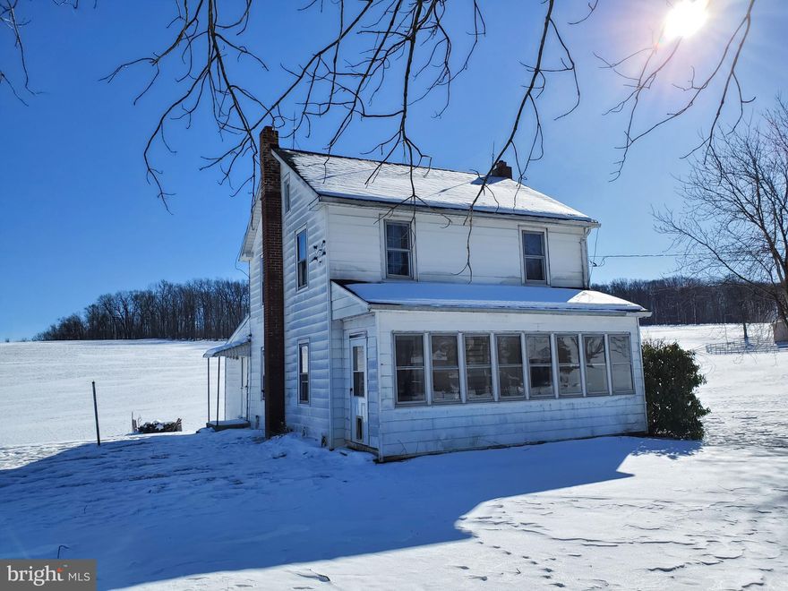 ATTENTION INVESTORS! Great opportunity - 1930s 4 bedroom, 1.5 bath farmhouse on  1 acre surrounded by cornfields and pastures on a quiet country road! The home is being sold AS IS and is ready to be rehabbed. Bring your ideas and imagination - it has lots of potential! Per township requirements, next owner is required to replace septic with a sand mound. Part of the property is currently farmed - buyer can decide if they want to continue leasing or expand the already extensive yard to the full acreage.