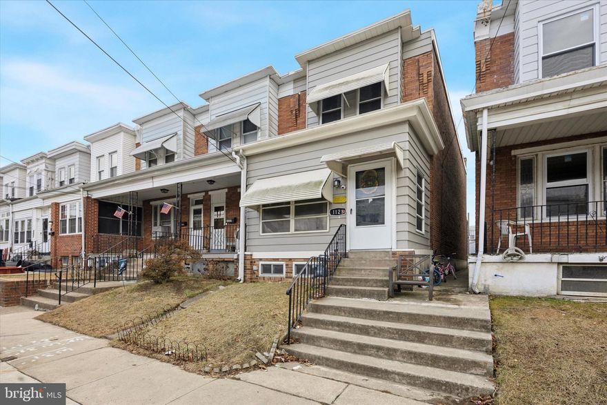 Welcome to 1121 E 11th Street a beautifully renovated end-unit row home offering modern updates, an open layout, and ultimate convenience. Fully remodeled in 2022, this 3-bedroom, 1.5-bathroom home is ready for immediate move-in!

Step into the enclosed front porch, a perfect bonus space for relaxing or welcoming guests. From there, enter the open-concept living area, featuring luxury vinyl wood flooring, recessed lighting, and a bright, airy feel throughout. The freshly painted walls provide a modern and neutral backdrop, allowing for easy personalization.

The updated kitchen boasts all stainless steel appliances—including a stove, refrigerator, and dishwasher—complemented by a brand-new granite countertop. Just off the kitchen, the convenient laundry area adds to the home's functionality, complete with an updated half bath on the main level.

Renovations in 2022 included a new water heater, gas furnace, central air system, updated electrical, and improved plumbing, ensuring peace of mind for years to come. The rear fenced-in yard offers a private outdoor space perfect for relaxing, gardening, or entertaining.

Located near major highways and shopping centers, this home offers an excellent location with easy access to everyday essentials and commuting routes. Don’t miss your opportunity to own this beautifully upgraded home—schedule your showing today!