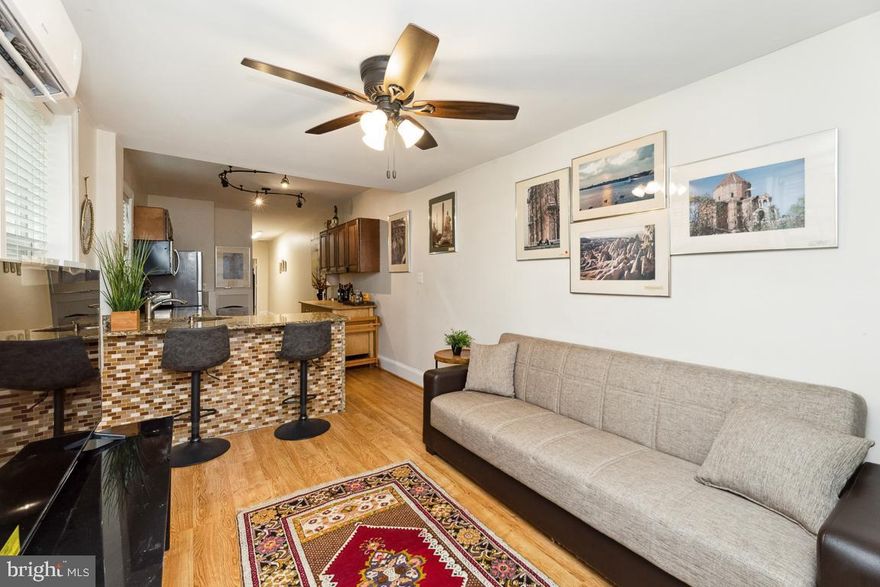 Charming Capitol Hill apartment in historic building provides private outdoor space and is less than one block to Eastern Market Metro.  In the heart of Barracks Row, with its numerous legendary bars and restaurants, this location is considered a DC destination spot.  Multiple choices for grocery stores, unique boutiques, and other amenities within walking distance offer a very convenient lifestyle. 
This Stylish and Spacious  one bedroom, with den, boasts: 
Updated kitchen,  Bay Front bump out in sun filled living room, 13 foot ceilings, private deck and a shared common outdoor space.