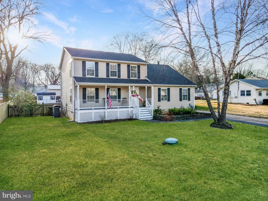 Renovated home in sought after neighborhood of Loch Haven Beach. Whole house interior renovation 2017, all systems updated 2018, new roof!  A slate walkway leads to the front porch. Entering the home you immediately notice the hardwood floors throughout the main level. The kitchen has white cabinets with modern handles & granite counters. The appliances are stainless and include under the counter microwave, downdraft glass cooktop stove with convection oven & French door refrigerator. The kitchen is open to the family room & dining room. Two large sliding doors lead to the back deck. Family room has a wood burning fireplace with a shiplap accent wall and mantel. The front living room can be used as another living space or office. Upstairs are 4 bedrooms and 2 full baths. The primary bedroom overlooks the backyard/pool and has a walk-in closet and ensuite. The primary bath features a double vanity & large tile shower with double shower heads. The hallway bathroom has tile floors, a tub with tile surround and a double vanity. The laundry closet rounds out the upper level. The accessory dwelling unit (ADU) is a half story below the main level. It has a separate side entrance, as well as an interior entrance, and is a studio apartment. It has a kitchen, full bathroom w/ shower & closet. Outside the large backyard is fully fenced. The pool & large deck are great for entertaining or just relaxing. The pool deck and walkway are stone aggregate. Community of Loch Haven offers a beach w/ swimming area, community pier, boat ramp, tennis courts, playground and basketball court. Check with neighborhood for boat slip availability. South River Farm Park is a short walk and offers hiking, nature trails and dog beach.