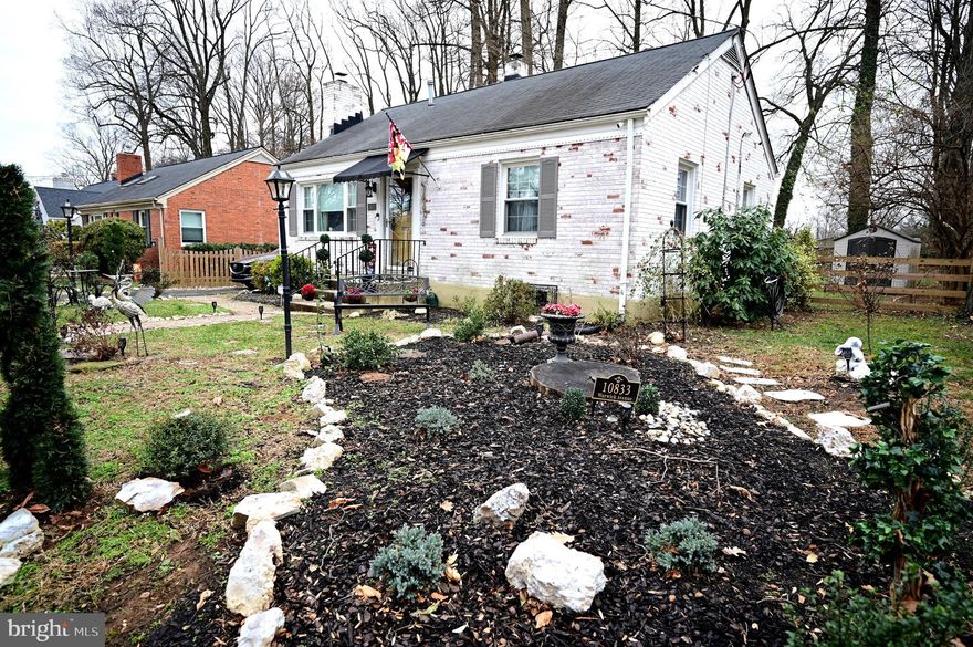 Character & Charm are throughout this amazing one level rambler in Fairfax City. No detail is missed. This home is updated inside and out, featuring three spacious bedrooms (or a versatile den), on a 1/4 acre level lot. The spacious, eat-in kitchen includes a custom backsplash, washer•dryer, and refrigerator (all 2025) as well as a newer hot water heater (2022) and soft-touch cabinetry (2015). Additional updates include crown and chair molding (2025), HVAC (2022), remote custom ceiling fan (2024) and all light fixtures as well as a 2024 electrical update that includes new GFCI (interior and exterior) outlets, extended wifi infrastructure, and new wired lighting sources (foyer and hallway). The exterior is extensively updated with limewashed brick, wired security lighting, a fully fenced rear yard, front yard fencing, landscaping, dental and crown moldings, Andersen storm doors, front door awning, leaf guard gutters, and solar accent lighting. Back inside, the inviting living room includes an operable, wood burning fireplace and a second (infrared) fireplace that conveys. The home sits directly across from Fairchester Woods Park, ensuring quick access to green spaces and recreational activities. Additionally, the prime location is walking distance to coffee shops, shopping centers, major interstates (66/495), and a variety of restaurants. This home is the perfect union of comfort and charm in the greater DMV!