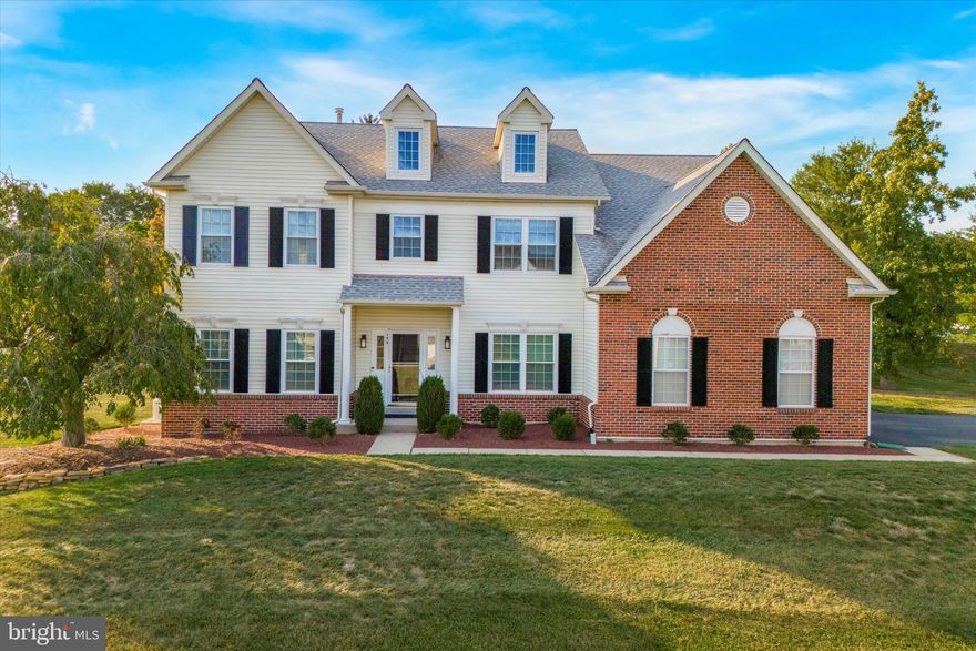 OPEN HOUSE 10/6 CANCELLED - Property is under contract. Welcome to 159 Raven Hollow Dr. in the desirable Raven Hollow neighborhood in Montgomery Township. This stunning 4 Bedroom, 2 Full and 1 Half Bath executive home offers over 3100 square feet of living space on a beautifully manicured 2/3 acre lot, set back from the street. Upon entering, you are welcomed into a lovely two-story foyer, with turned staircase, wainscoting, crown molding and newer floors throughout the first floor (2020). To the right of the foyer is a private office with French Doors – perfect for those working from home. To the left is a formal Living Room with crown molding, opening into the spacious Dining Room, with crown molding and chair rail. The updated gourmet Kitchen features newer stainless steel appliances, granite countertops, tile backsplash, recessed lighting and adjacent Breakfast Area. The bright and spacious Family Room showcases custom built-in cabinetry, wet bar, recessed lighting and gas Fireplace. A sliding door from the Kitchen opens to the fabulous outdoor living space, with covered bluestone paver Patio, recessed lighting and ceiling fan, wood burning stone Fireplace, TV and outdoor Kitchen with built-in gas grill and refrigerator. An updated Powder Room with beadboard wainscoting, large Mudroom area with custom cabinetry and separate Laundry Room with outside entrance complete the first floor. The second floor features an expansive Primary Bedroom Suite, with vaulted ceilings, Sitting Room, two organized Walk-In Closets and En-Suite Bathroom, with whirlpool tub, dual vanities and glass enclosed stall shower. Three additional generously sized Bedrooms and updated Hall Bathroom (2020) complete the second floor. The full finished Basement offers entertaining and workout space, along with plenty of storage. Additional updates include a newer roof (2016), water heater (2022), dual zone HVAC (2018), dual sump pumps with battery back-up (2022), generator (2018). Located in the highly rated North Penn School District and conveniently located near routes 309, 611 and the PA Turnpike, minutes from shopping and restaurants of Ambler and Doylestown and a short walk to Windlestrae Park, with playground, sports fields and tennis courts. Make an appointment today to see this special property!