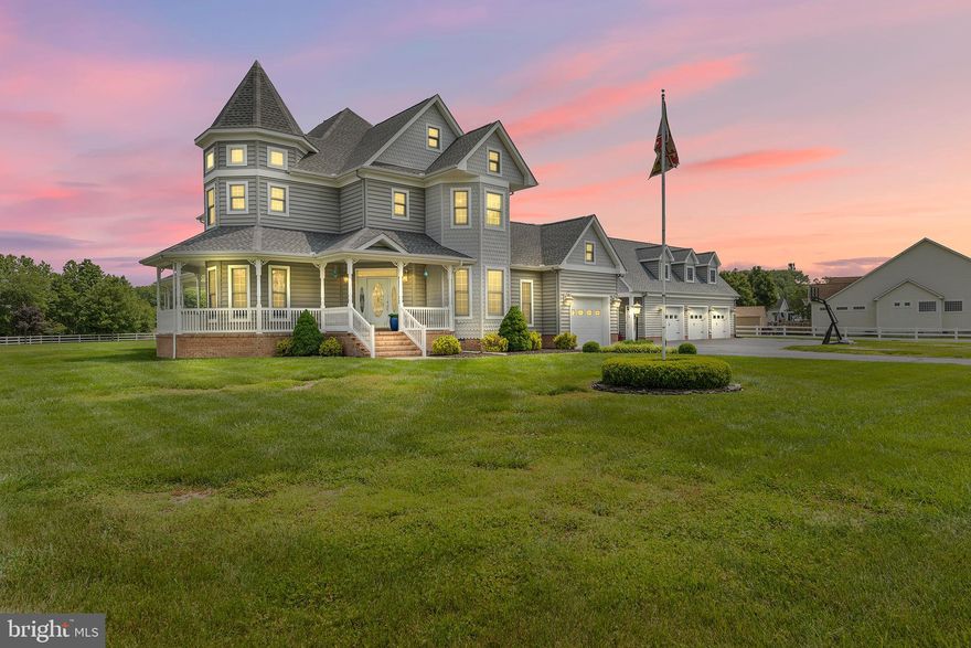 Wonderful 5 Bedroom, 4.5 Bath Victorian home completely decorated throughout with a coastal
theme!  Home was custom built in 2003 with 2x6 construction featuring a gorgeous wraparound
porch.  The property sits on 1.56 acres which includes a separate deeded boat slip directly
across the street with a pier and boat lift. Additionally, there is also easy access to a public
boat ramp across the street. The main level has an open concept living room with cozy gas
fireplace adjacent to the kitchen with upgraded double wall ovens and center island. Gorgeous
hardwood floor throughout most of main level with neutral tile flooring in kitchen and
sunroom. Main level has a separate dining area, small butler’s pantry with sink, and a sunroom
off the kitchen with tons of light for a great reading/sitting area. First floor office with French
doors. Upper level Primary suite features a huge second floor balcony overlooking level yard.
Renovated ensuite bath with double vanity, luxury tub and shower complete with walk in
closets.  Spacious bedrooms throughout 2 nd  floor with expansive storage space in attic. Attic
can be converted into additional living space. Home has a 1 car attached garage for convenience and additional storage.  Detached 3 car garage with 1 bay converted to a full exercise room with full bath (could be converted back ifnew owner prefers). Detached garage complete with a 1 bedroom 1 bath apartment above garage, which is currently rented with excellent income. Oversized driveway was just repaired
and resealed.  Roof for main home is approximately 2.5 years new and the detached garage
roof will be replaced in the coming weeks.  Exterior gas hook up for a future grilling station or
hot tub. Close to Ocean City and local restaurants/shops including library and post office.  No
HOA!  A Must See!