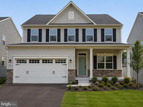 Photo of 9817 Sawmill Branch Trl, ELLICOTT CITY, MD 21043 (MLS # MDHW2068414)