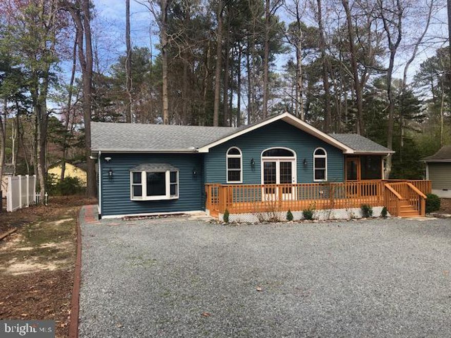 Taking back up offers! Open house cancelled .  Unbelievable 3 bedroom 2  bath Ocean Pines home which has been totally re freshed and is move in ready for the new owners!! This home features a large driveway with room for multiple vehicles or other toys, a huge front deck which leads to the very spacious covered screened in deck, both of which have been updated and freshly painted. The screened in deck has just been re screened and is ready for the season! A big feature of this home is the huge bonus room with a private entrance which could be turned into another bedroom, an in-law suite, a game room, a rental suite or use your imagination!! Also, there are high cathedral ceilings in the main living and dining area with tons of natural light! The homes roof was recently replaced new as well!! Recent improvements inside include new countertops, new tile floor, new backsplash and built in microwave in the kitchen and newer stainless-steel appliances and front-loading washer and dryer! Also new flooring in the bedrooms and hallway, new lights and ceiling fans, all new electrical switches, newer bathroom vanities, new attic stairs, fresh paint and much more! The outside features fresh landscaping with new plants and flowers, new stone and wood borders in the driveway, new stone in the back, freshly painted decks, new stepping stones and a practically new roof!! The HVAC, electrical and plumbing systems have been well maintained and fully inspected and in good working order. The Ocean Pines community is located just minutes to all area attractions including beaches, casino, Assateague Island National seashore and features a world class golf course and clubhouse, a private beach club with parking  a restaurant and pool in Ocean City, a newly renovated yacht club  with live entertainment and a tiki bar, multiple pools and tennis courts, basketball courts, a skate park and much more. This one will not last long so schedule your private showing today!!