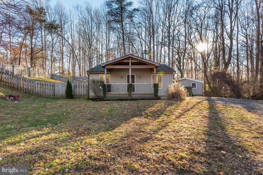 This adorable  WELL  kept 2 bedroom rambler  - offers open floor plan, freshly painted,  granite counter tops, white cabinets, under counter lighting, black appliances, back splash, and a pantry.
 Two nice size bedrooms with great closet space.  Large bathroom with tile surround tub/shower and
 washer & dryer.
 Nice floors and ceiling fans through out - Cute front porch with roof ,  deck right off of the kitchen.
 Fenced in backyard with  storage shed-  sitting on over a acre in a great location of Prince Frederick. 
conveniently located minutes from rt 4 - and near everything .
Come see for yourself!