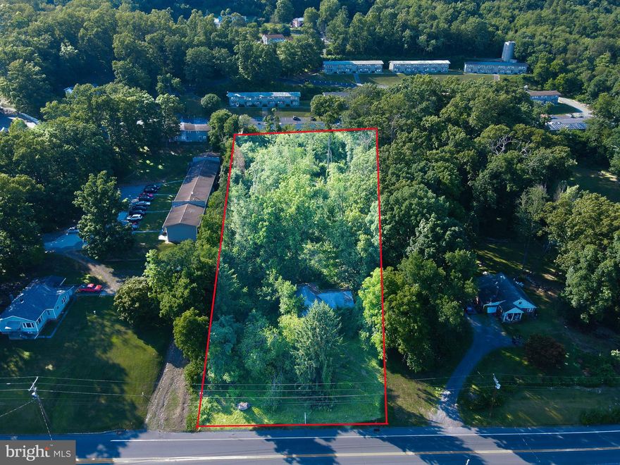 This 1.31-acre lot is located along business US 522 near Walmart, Lowes, Advanced Auto, Chipotle, Taco Bell, and Dunkin Donuts. The home on the lot hasn't been lived in many years.