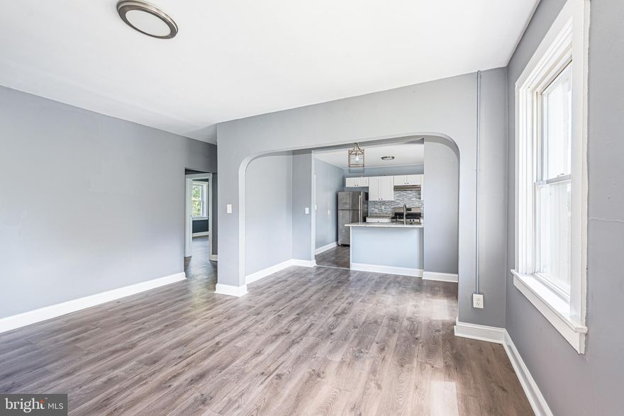 SPACIOUS UPDATED 2 BEDROOM 1 BATH APARTMENT! This unit is located in an 8 unit building and features all laminate wood flooring, spacious living room, separate dining area, updated kitchen with ss appliances, newer HVAC with central AC, and in-unit washer and dryer. Located steps from Bengie's drive through, shopping, and restaurants!  Must have good credit to be considered with no history of eviction filings.